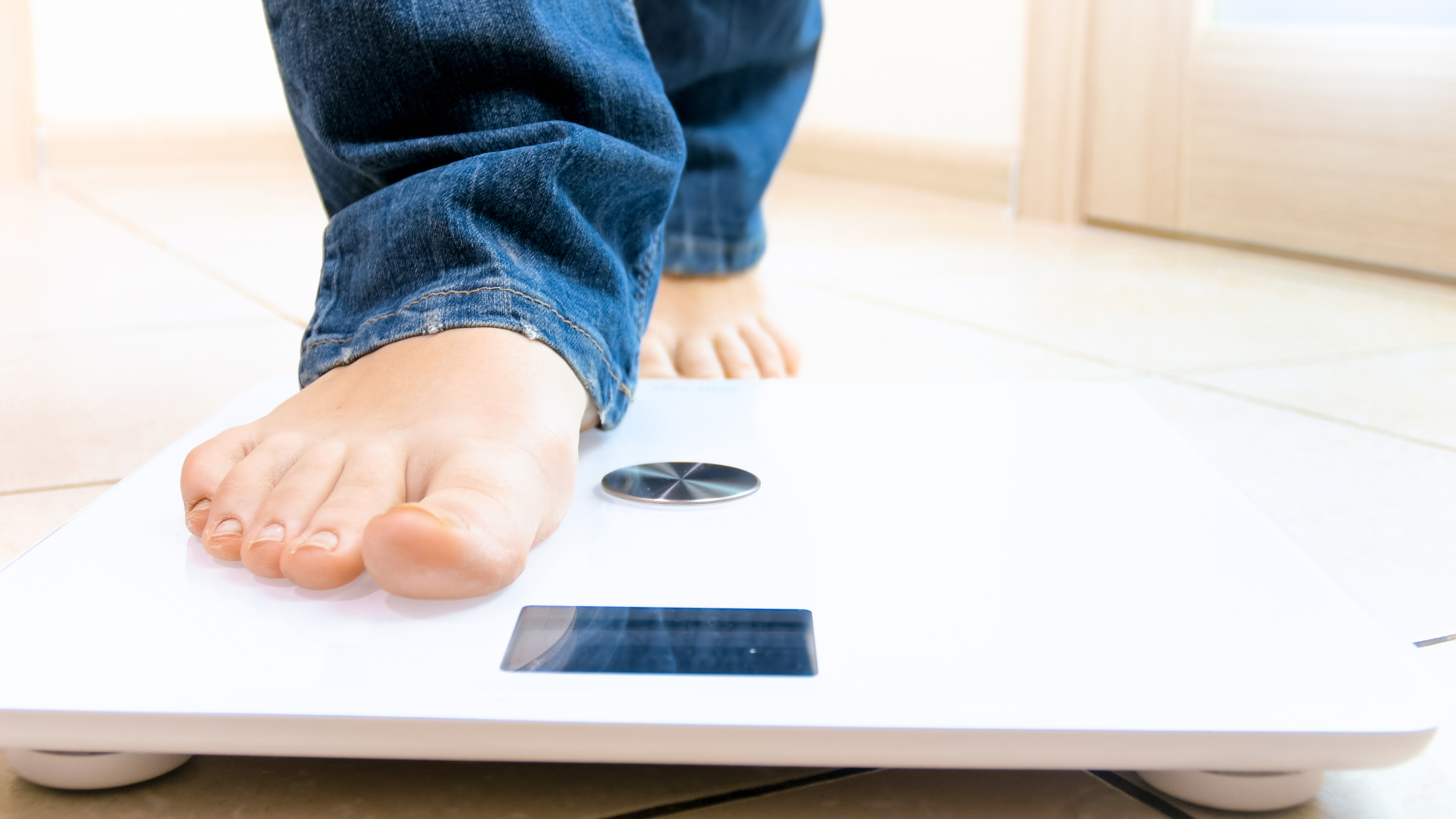 Person being weighed stock photo