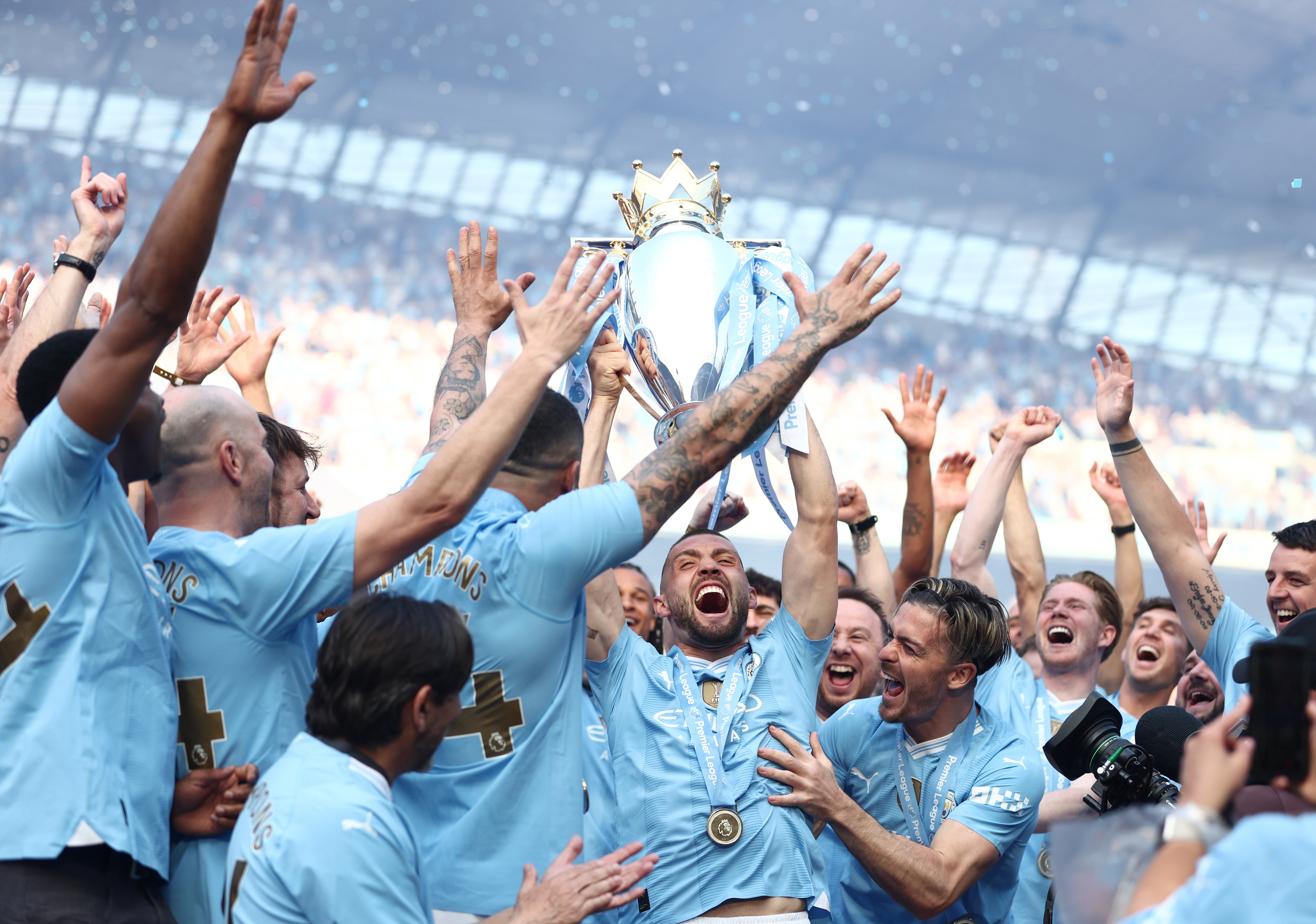 Mateo Kovacic of Manchester City celebrates with the Premier League Trophy after their team's victory during the Premier League match between Manchester City and West Ham United at Etihad Stadium on May 19, 2024 in Manchester, England. (Photo by Naomi Baker/Getty Images)