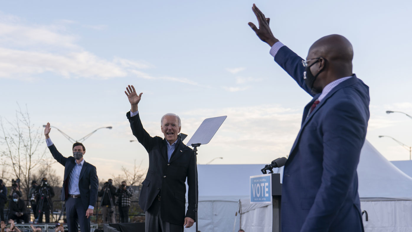 Joe Biden campaigning for candidates Jon Ossoff and Rev. Raphael Warnock in the Georgia Senate run-off elections.