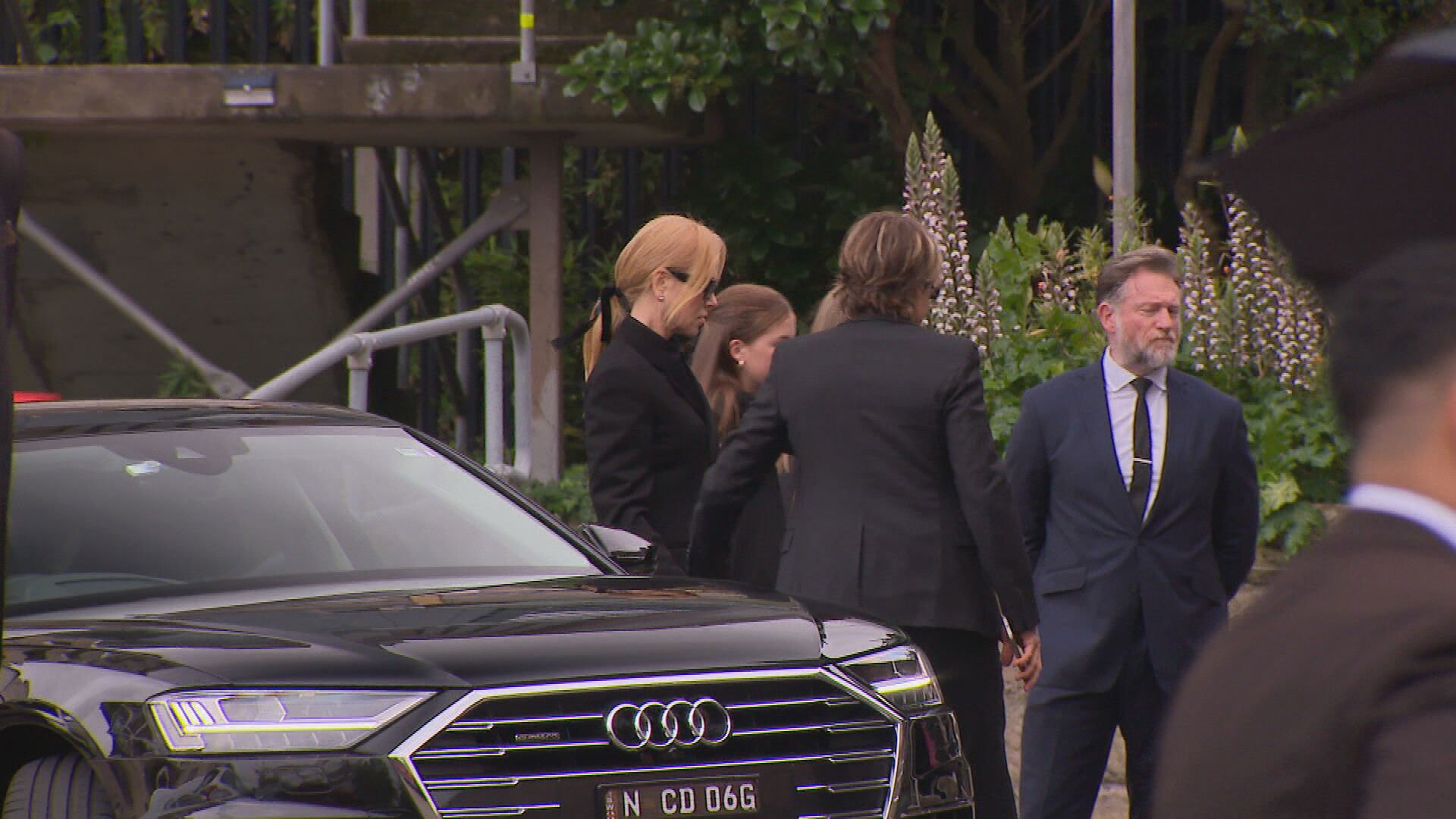 The actress arrived at the memorial service in Sydney with her husband Keith Urban and their two daughters.