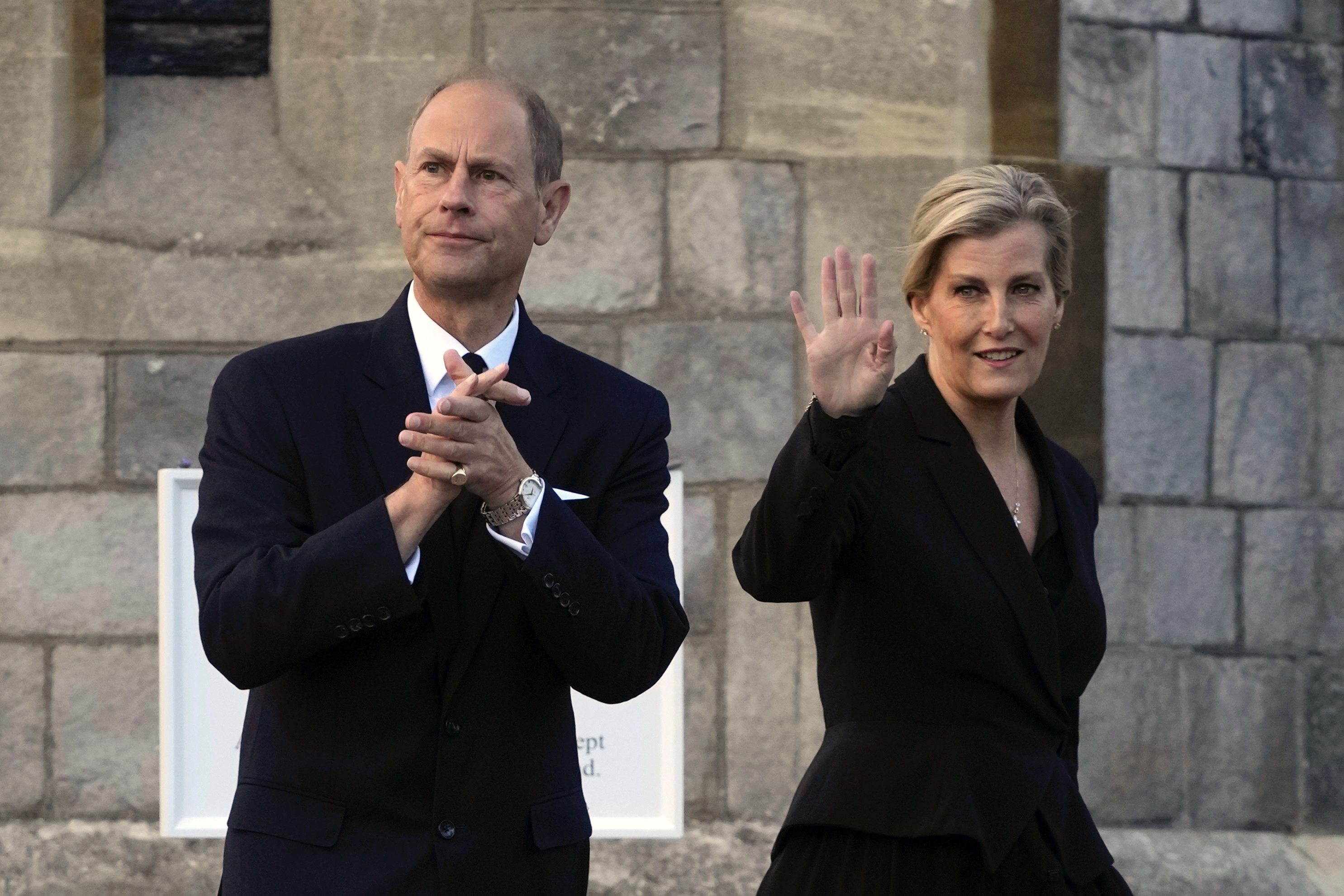 Prince Edward and Sophie, Countess of Wessex, wave to mourners outside the Windsor Castle in Windsor, England, on September 16, 2022. 