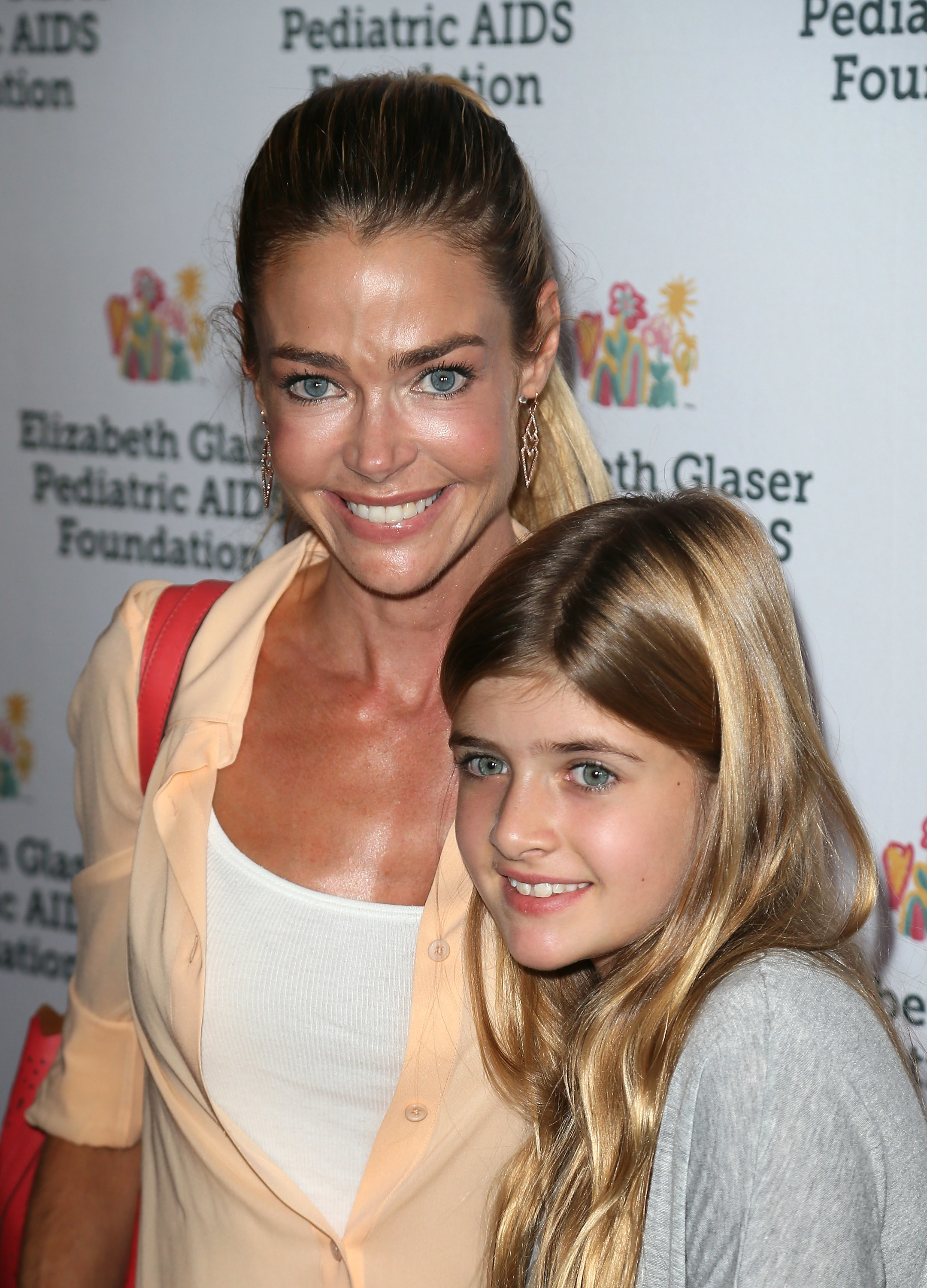 Denise Richards and Sam Sheen attend the Elizabeth Glaser Pediatric AIDS Foundation's 25th Annual "A Time for Heroes" celebration at The Bookbindery on October 19, 2014 in Culver City, California.