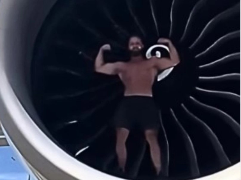 Baggage handler to front court after allegedly posing shirtless in aircraft turbine
