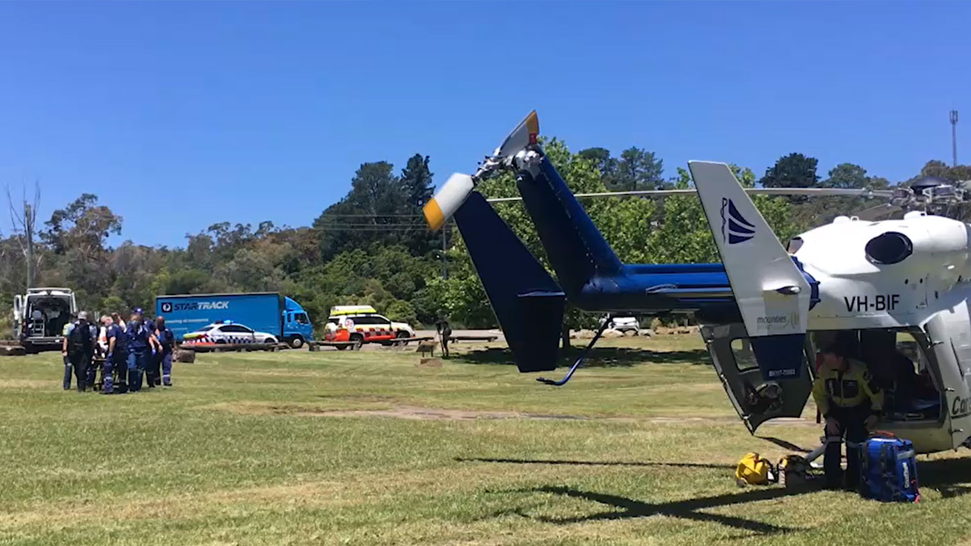 A man has been taken to hospital after injuring his left arm in a chainsaw accident.