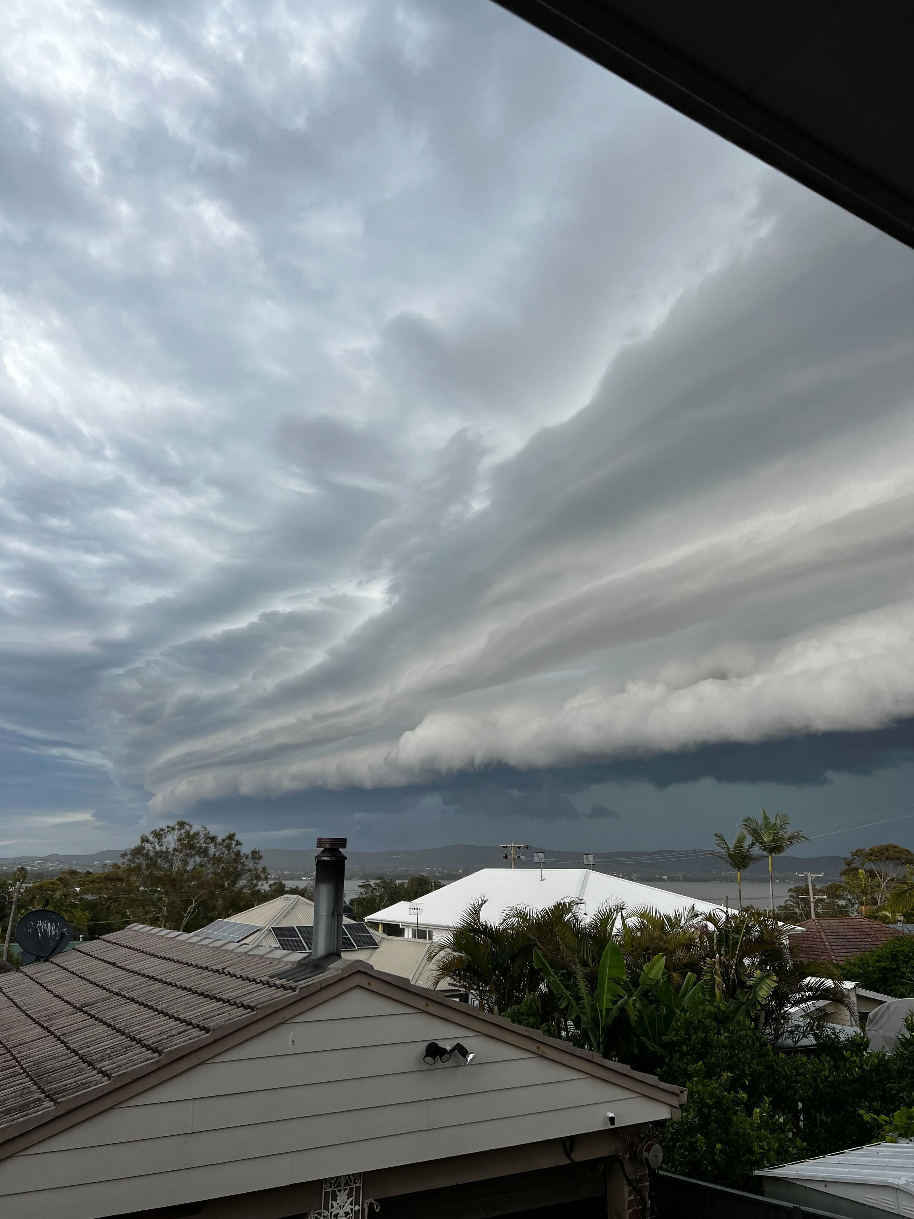 Ominous storm clouds over the Entrance, near Budgewoi.