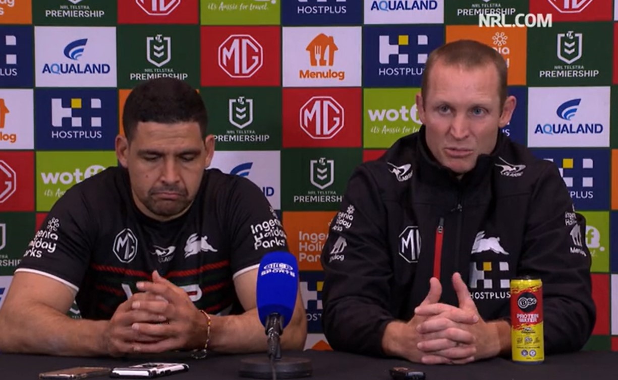 Cody Walker and Ben Hornby chat after losing to the Dolphins.