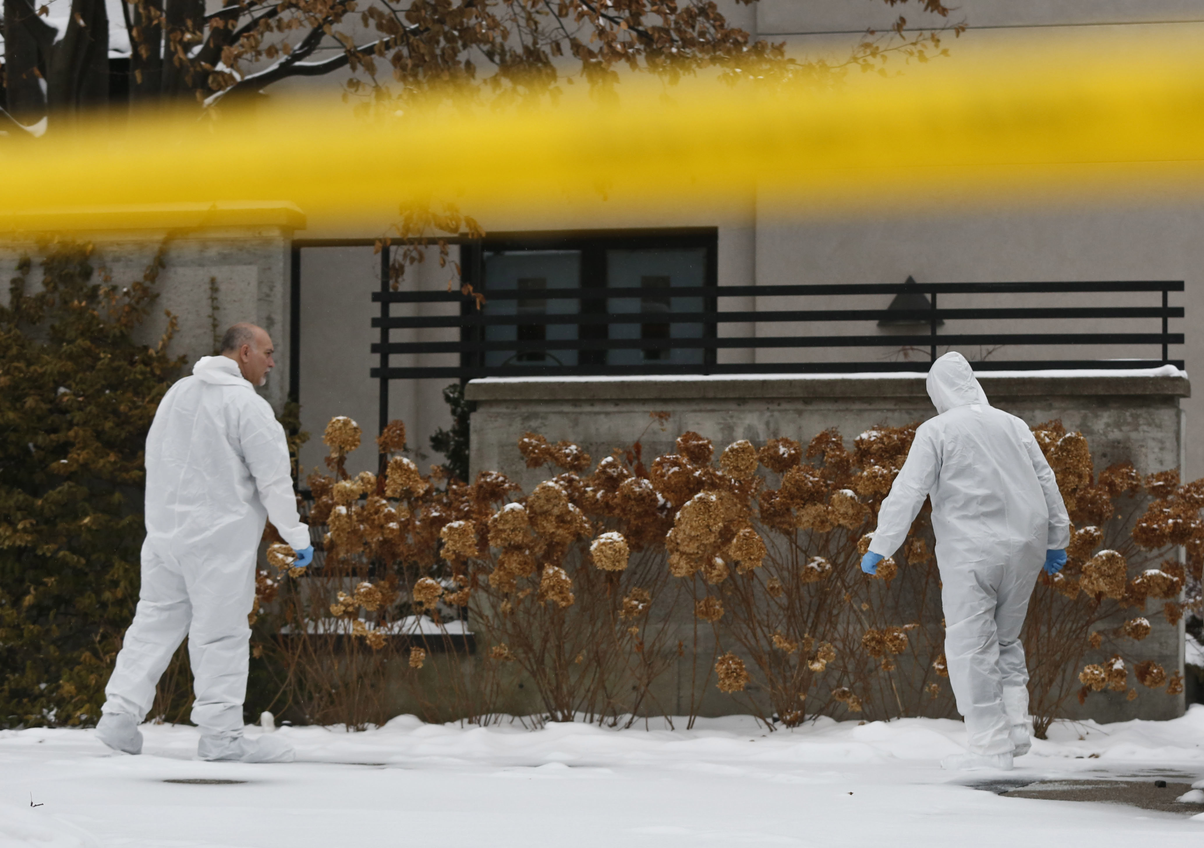 Forensic investigators continued their activities at 50 Old Colony Road following the suspicious deaths of Barry Sherman and his wife Honey.