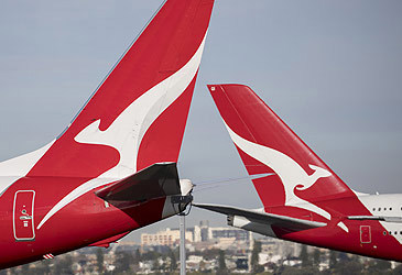 Qantas jet tails at Sydney Airport (Getty)