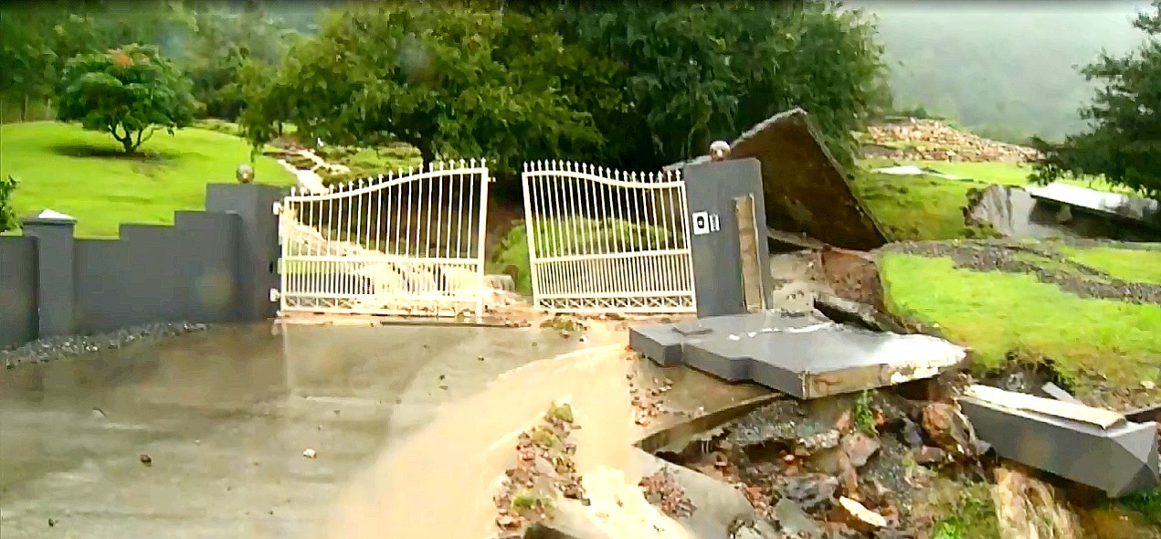 A teetering Gold Coast hinterland property are among  concerns as a result of Queensland's heavy wet weather. 
