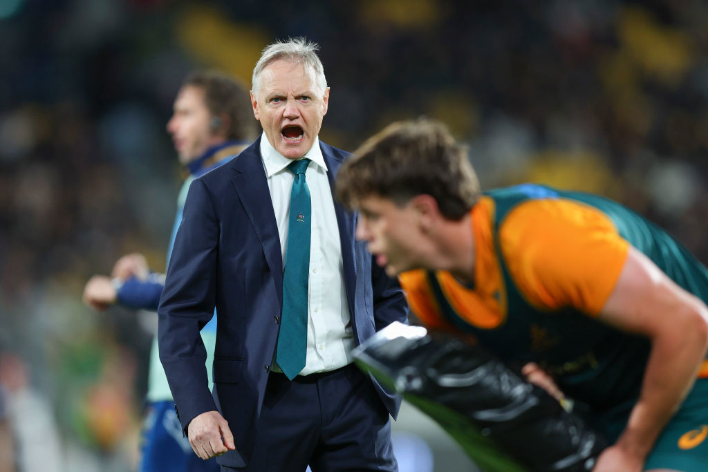 Coach Joe Schmidt of Australia talks to his players at Sky Stadium.