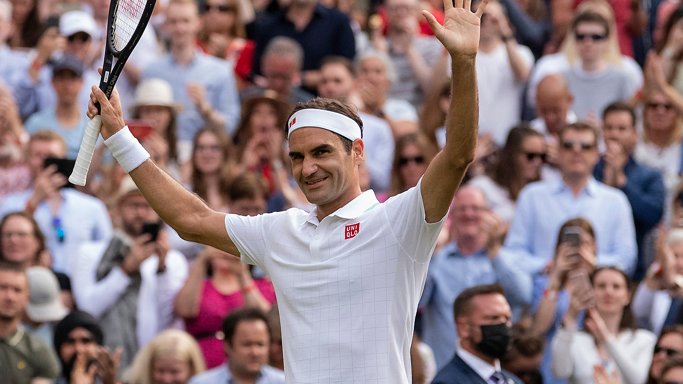 Roger Federer celebrates match point in the second round men's singles match against Richard Gasquet 