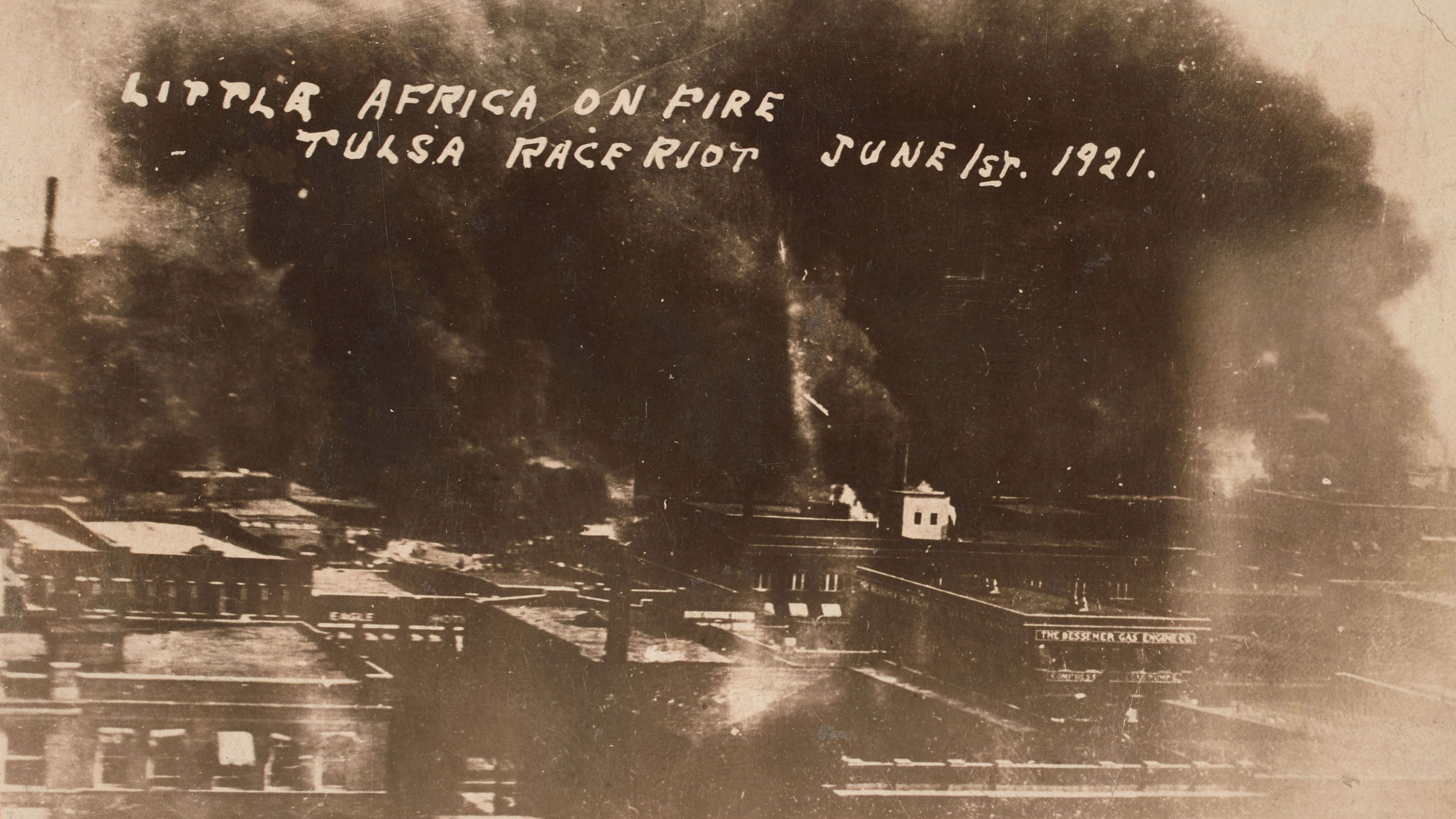 The Greenwood District burns during the mob violence on June 1, 1921. (Image gift of Cassandra P. Johnson Smith)