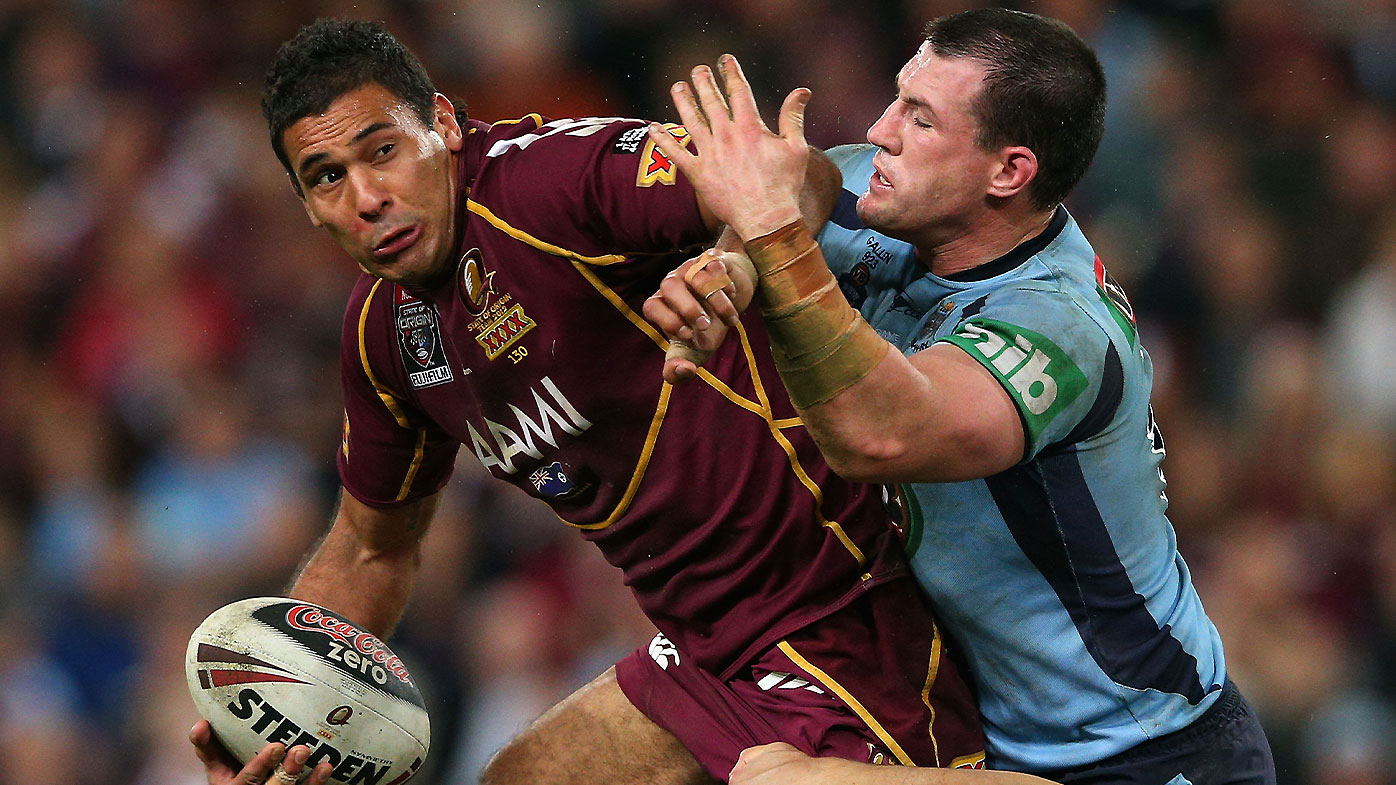 Paul Gallen attempts to tackle Justin Hodges in Game 3 of the 2012 State of Origin series