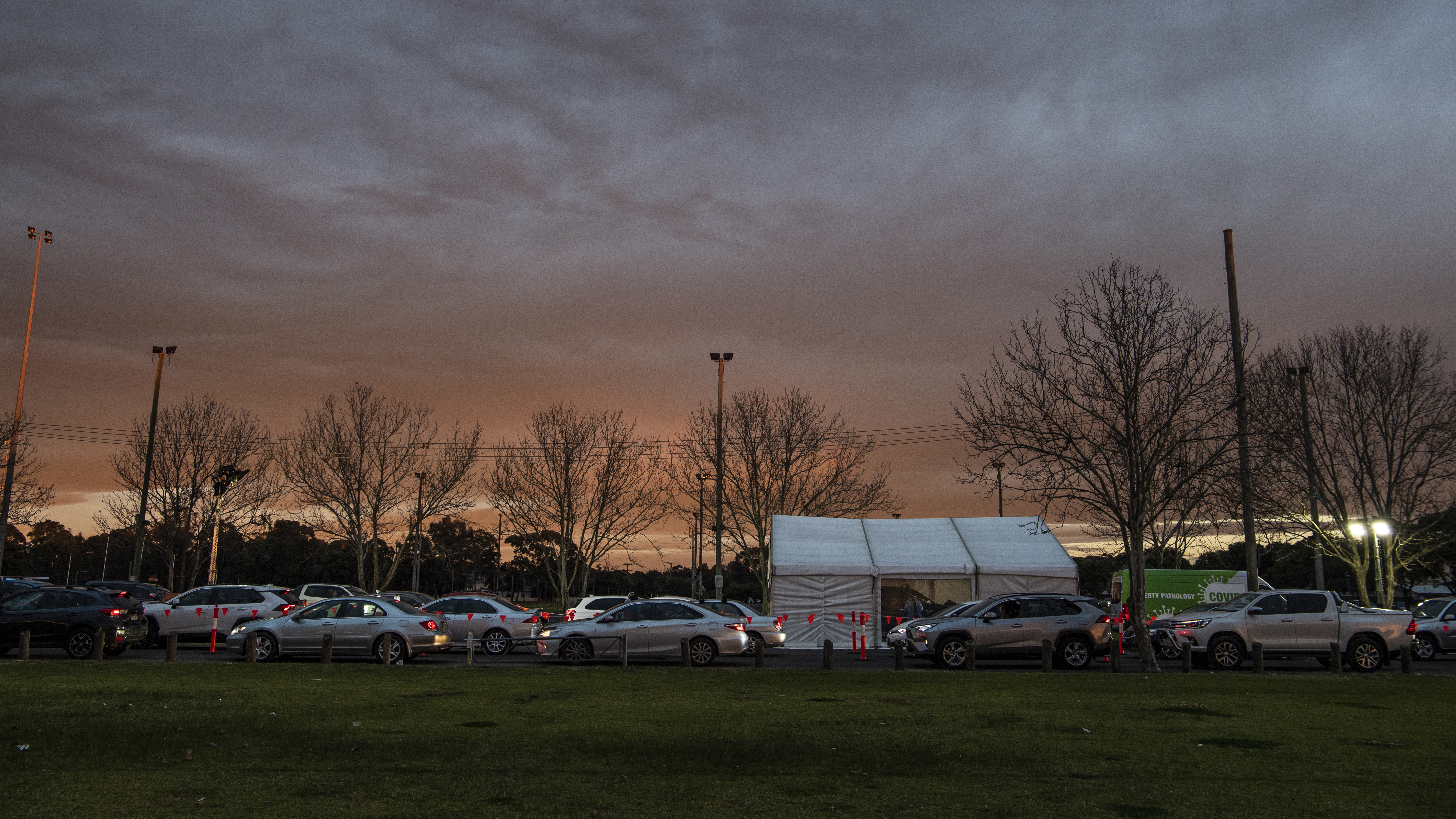 Long queues for the 24 hour COVID testing drive through clinic at Endeavour Sports Reserve, Fairfield West, Sydney.