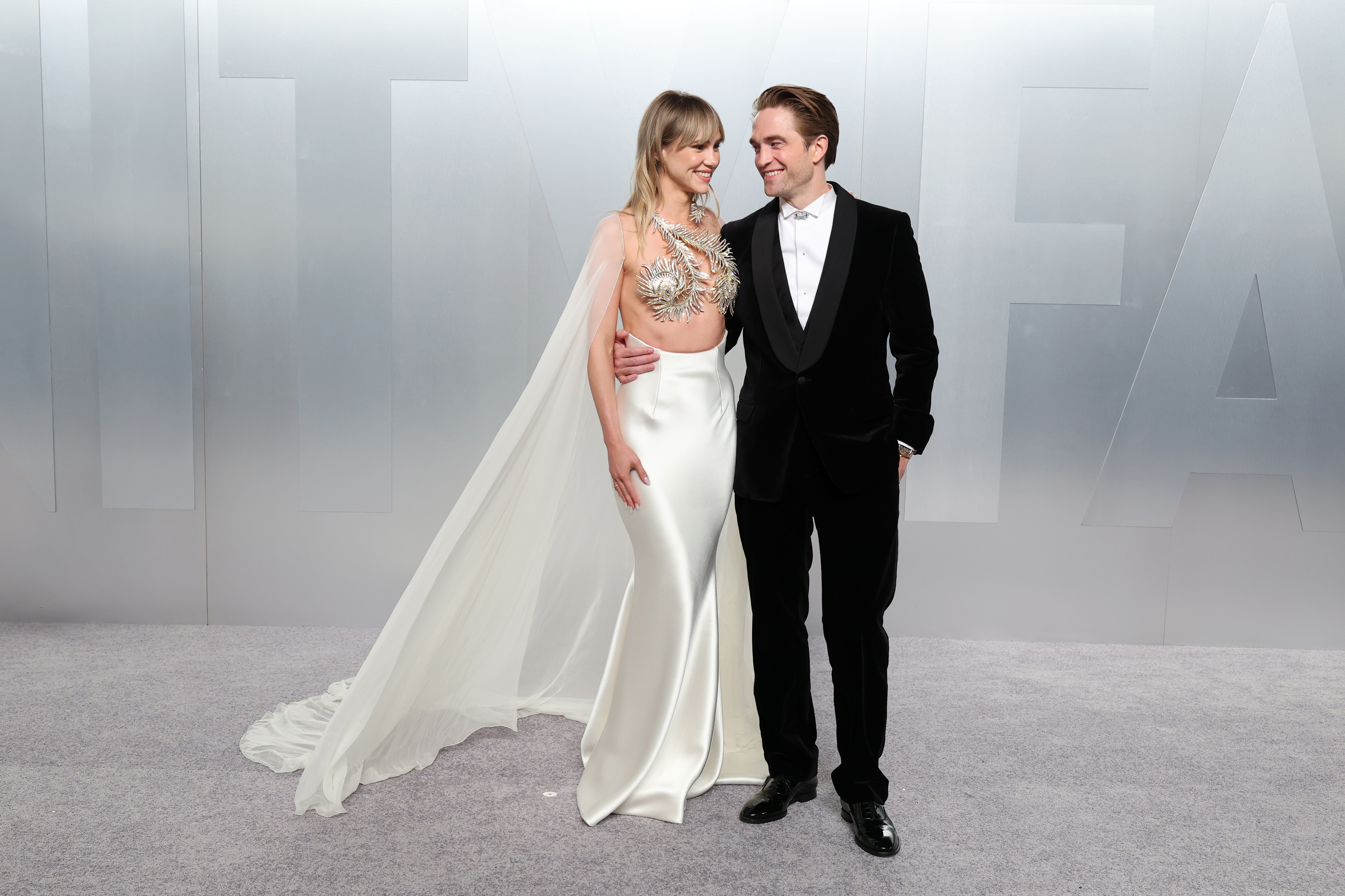 Suki Waterhouse and Robert Pattinson at the 2026 Vanity Fair Oscar Party held at the Los Angeles County Museum of Art on March 15, 2026 in Los Angeles, California. 