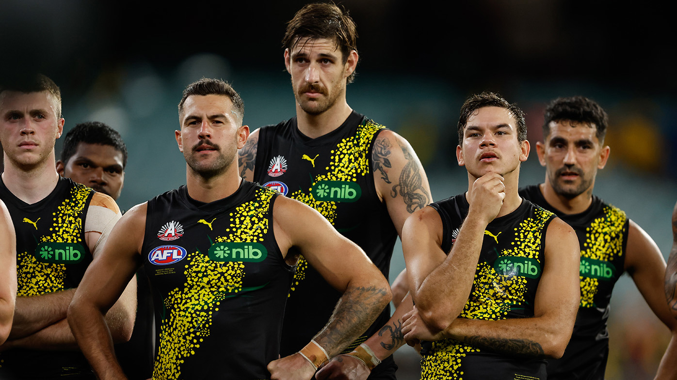 Jack Graham, Sam Naismith and Daniel Rioli of the Tigers look on during the 2024 AFL Round 07 match between the Richmond Tigers and the Melbourne Demons at the Melbourne Cricket Ground on April 24, 2024 in Melbourne, Australia. (Photo by Dylan Burns/AFL Photos via Getty Images)