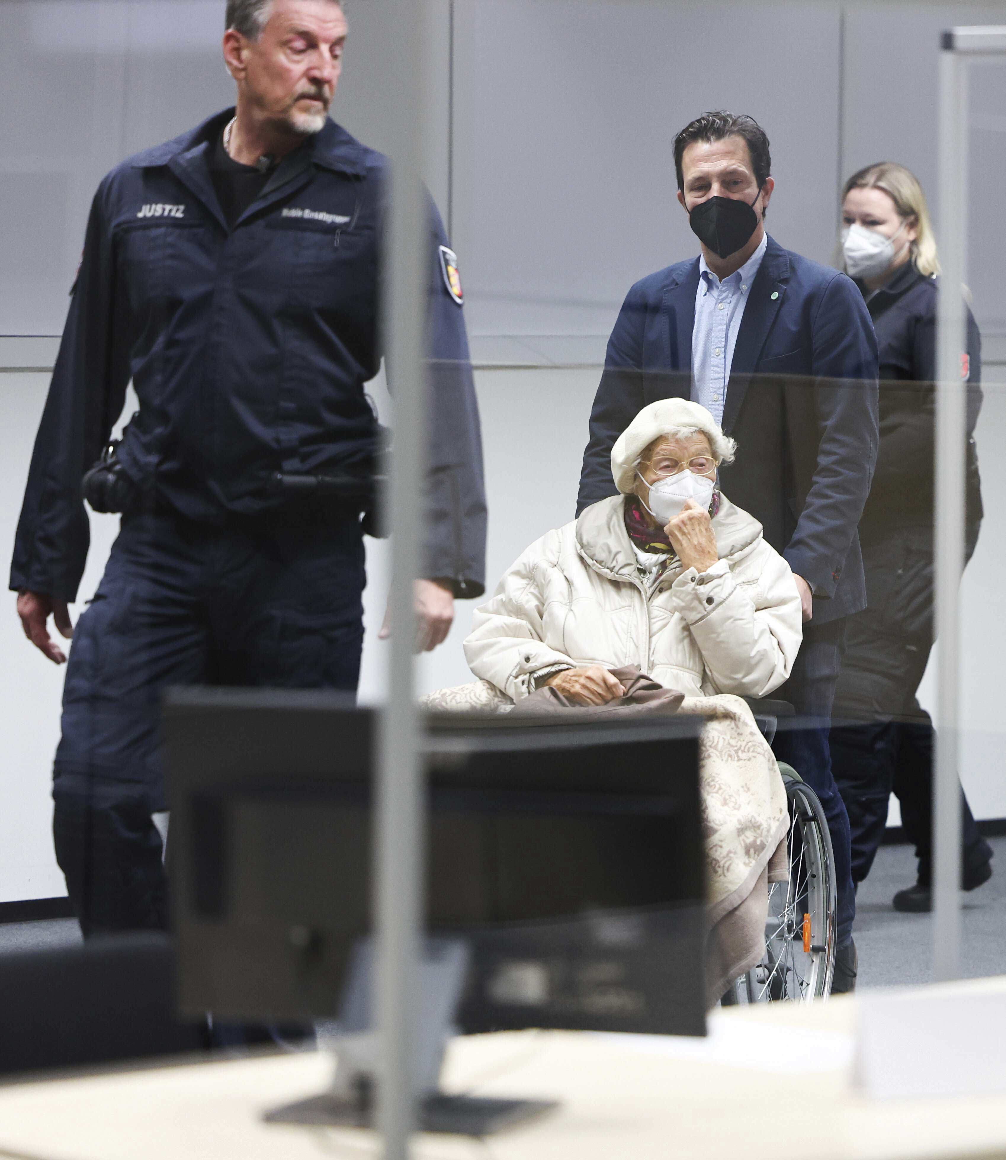 Irmgard Furchner, accused of being part of the apparatus that helped the Nazis' Stutthof concentration camp function, appears in court for the verdict in her trial in Itzehoe, Germany, Dec. 20, 2022.