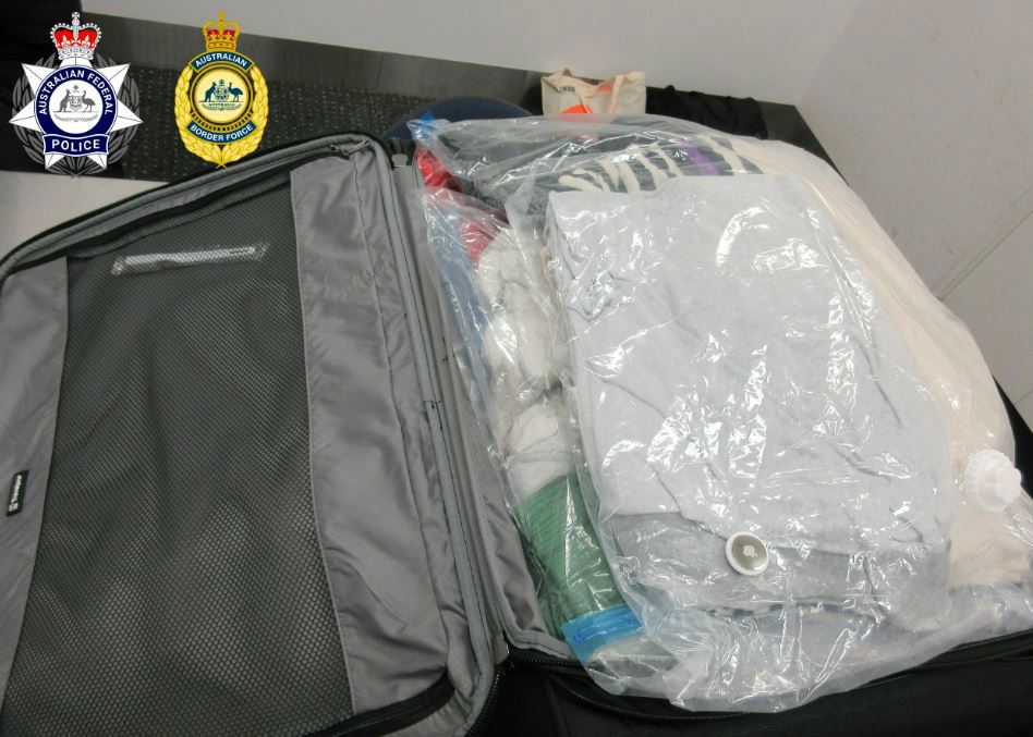 Two travellers have been charged over allegedly importing drugs into Australia hidden in luggage at Melbourne Airport.