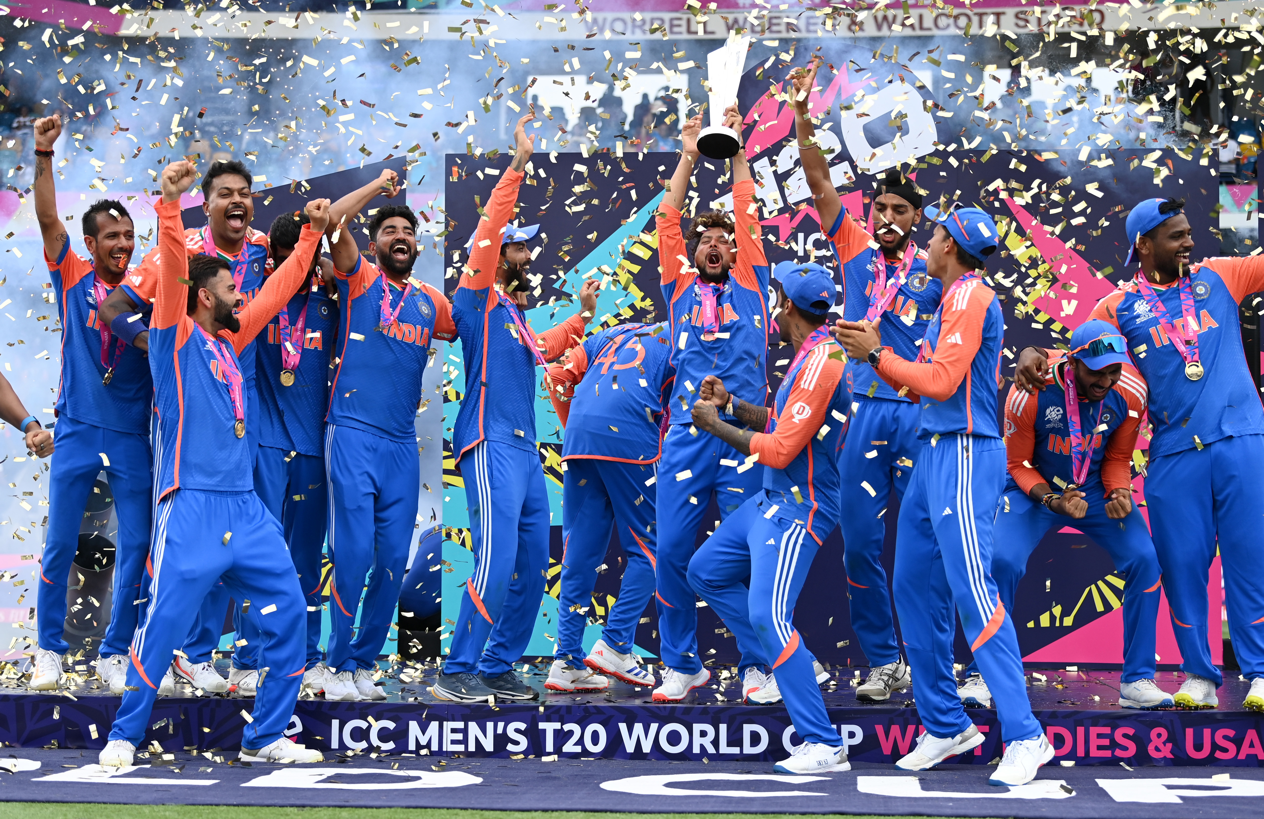 India lift the ICC Men's T20 Cricket World Cup Trophy following the ICC Men's T20 Cricket World Cup West Indies & USA 2024 Final match between South Africa and India at Kensington Oval on June 29, 2024 in Bridgetown, Barbados. (Photo by Gareth Copley/Getty Images)