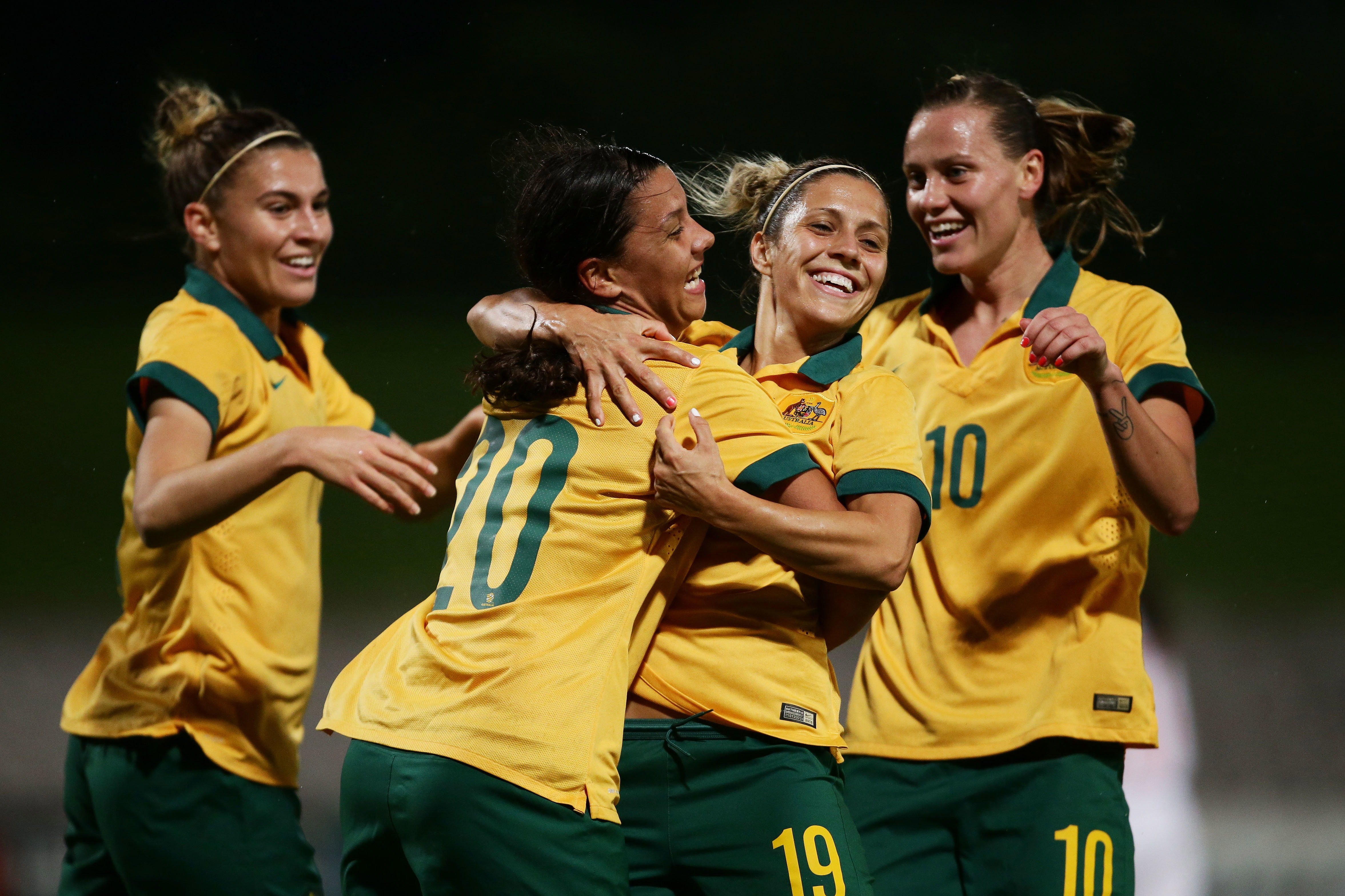 Sam Kerr of the Matildas celebrates with team mates after scoring a goal during the international women's friendly match between the Australian Matildas and Vietnam in 2015.