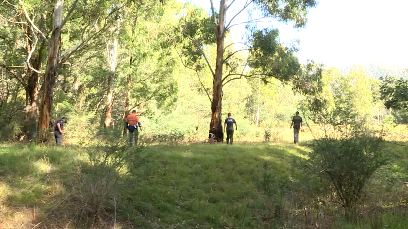 Police search bushland for missing clues and the two friends who vanished.