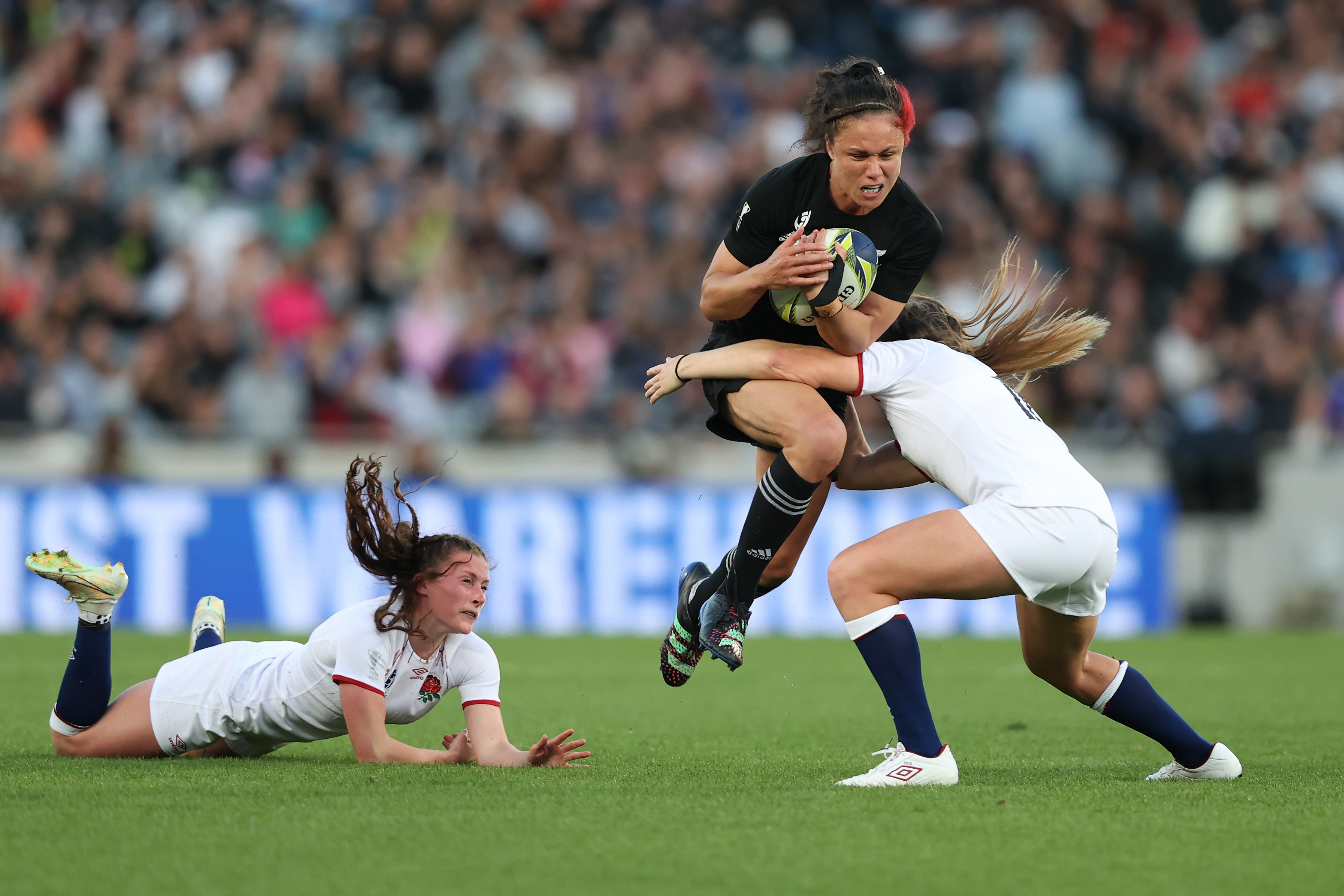 Ruby Tui of New Zealand is tackled during the Rugby World Cup.