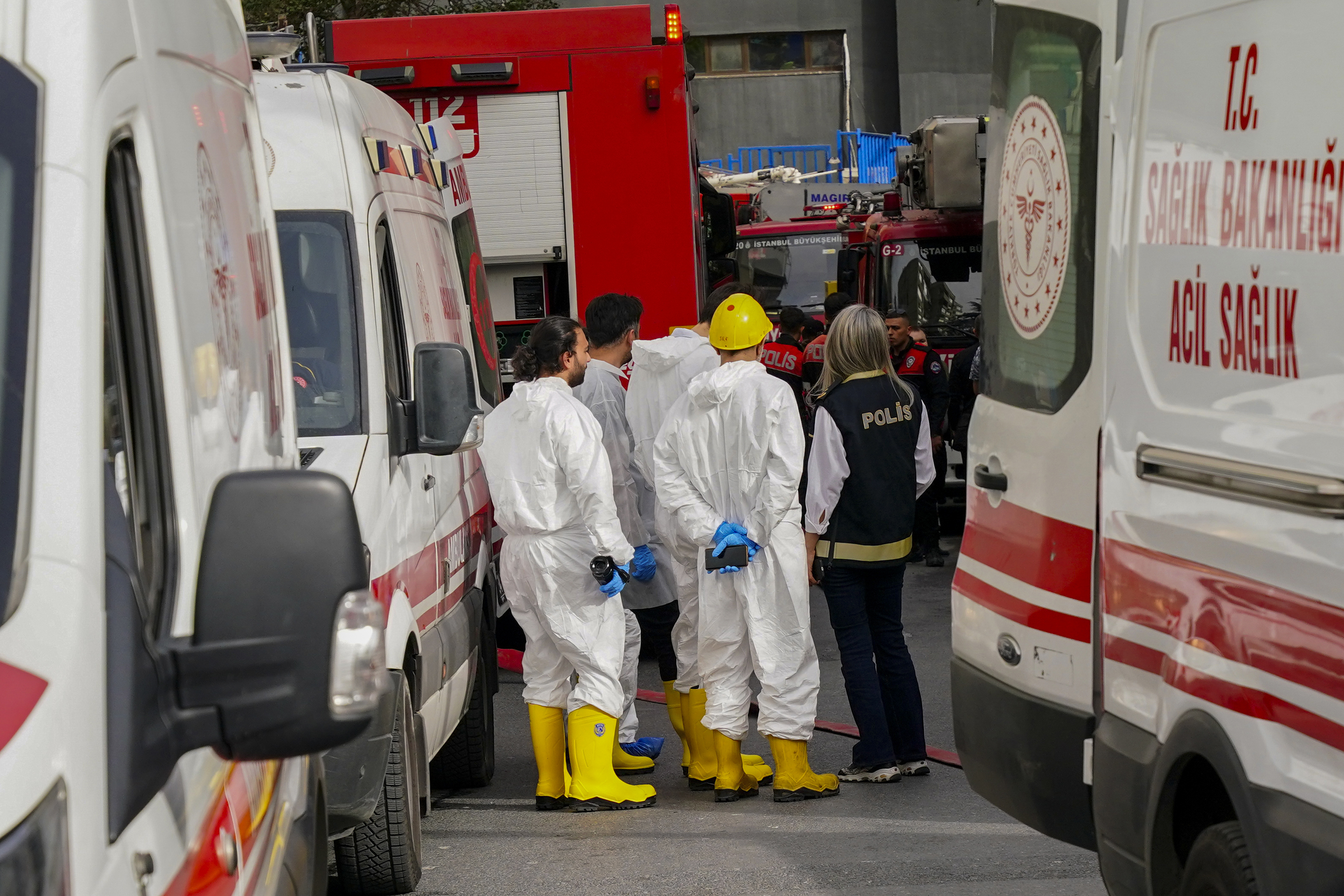Firefighters and medical teams work after a fire broke out in a nightclub in Istanbul, Turkey, Tuesday, April 2, 2024