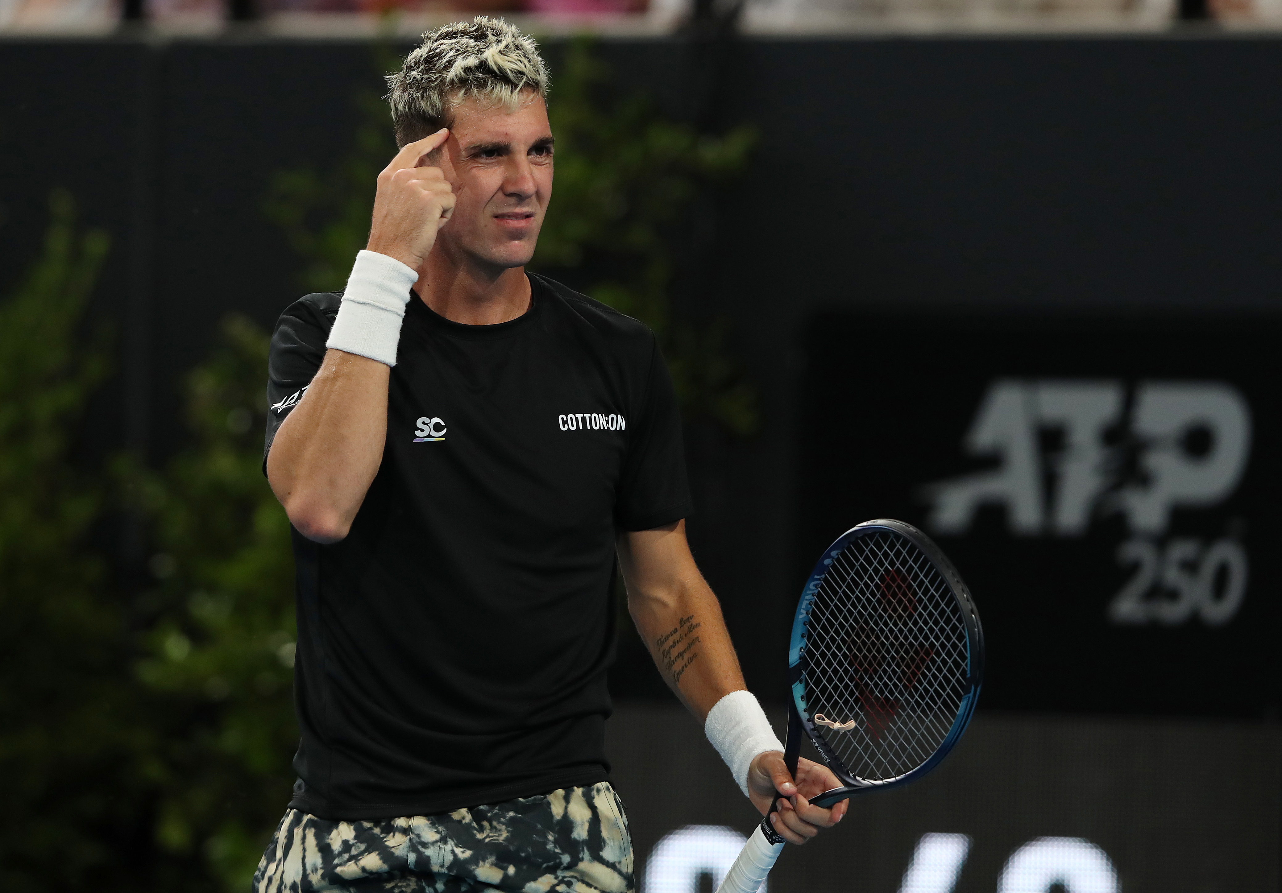 ADELAIDE, AUSTRALIA - JANUARY 09:  Thanasi Kokkinakis of Australia reacts as he  competes against Alexei Popyrin of Australia during day one of the 2023 Adelaide International at Memorial Drive on January 09, 2023 in Adelaide, Australia. (Photo by Sarah Reed/Getty Images)
