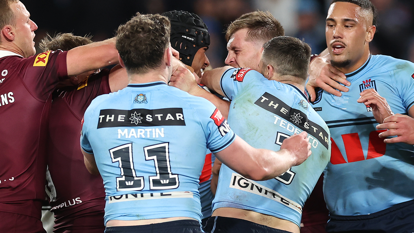 Stephen Crichton of the Blues and Cameron Munster of the Maroons confront each other during game three of the State of Origin