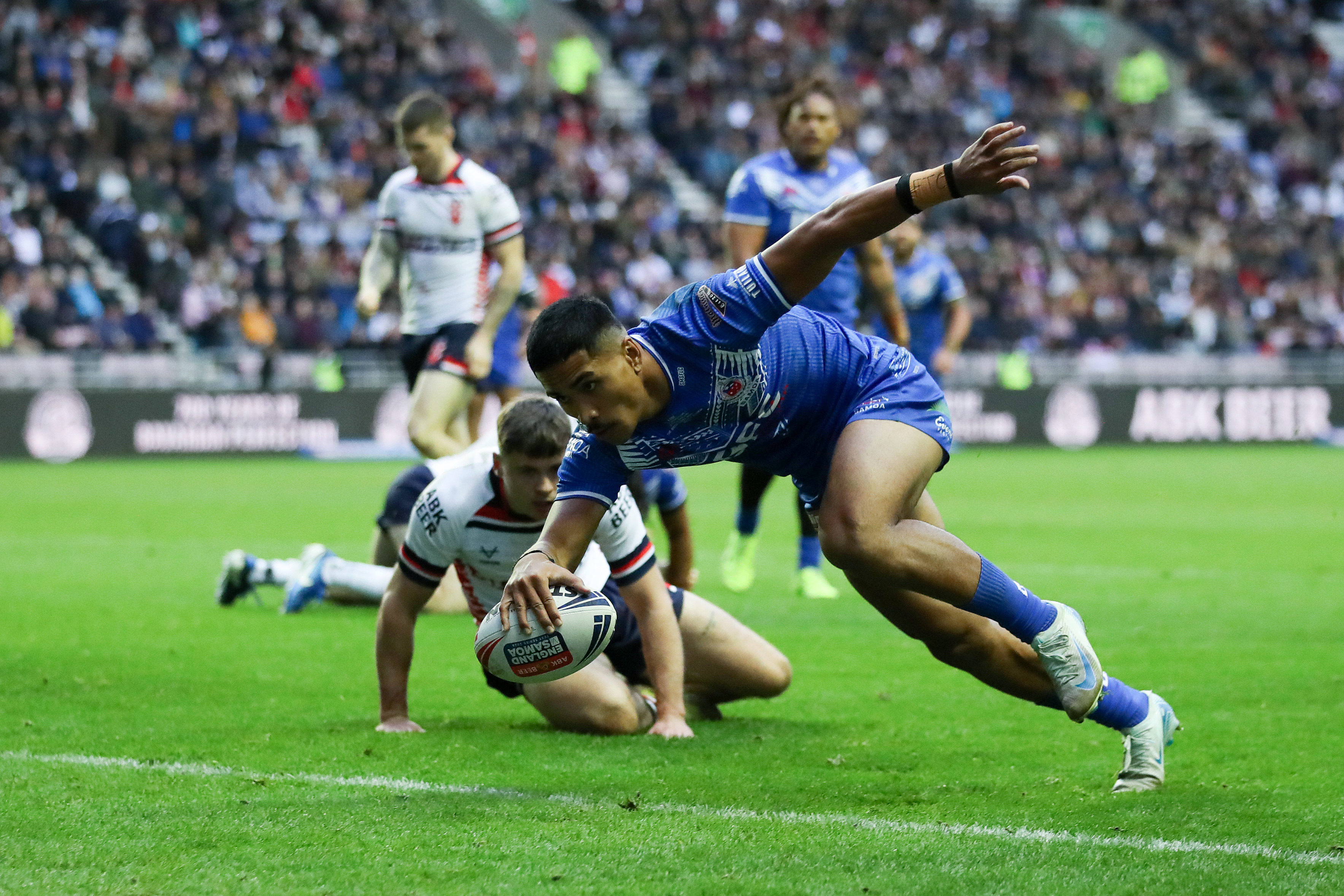 Deine Mariner of Samoa scores his sides second try during the Autumn International Series test match between England and Samoa at Brick Community Stadium on October 27, 2024 in Wigan, England. (Photo by Jess Hornby/Getty Images)