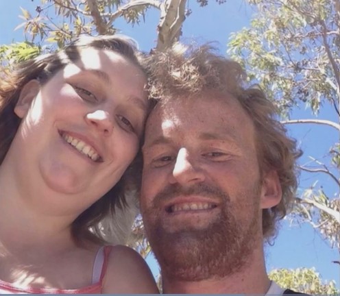 Damien Osbourne (right) with his partner Tara McConchie.