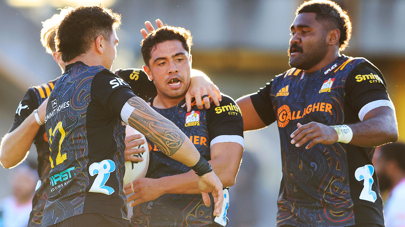 Anton Lienert-Brown of the Chiefs celebrates a try with team mates during the round four Super Rugby Trans-Tasman match between the Chiefs and the Melbourne Rebels at Leichhardt Oval on June 06, 2021 in Sydney, Australia. (Photo by Mark Evans/Getty Images)