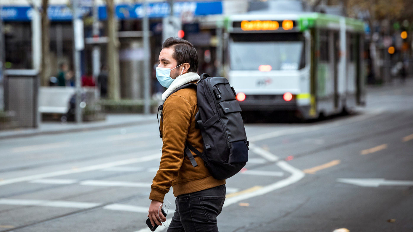A man wears a face mask due to the Covid-19 pandemic in Melbourne's CBD.