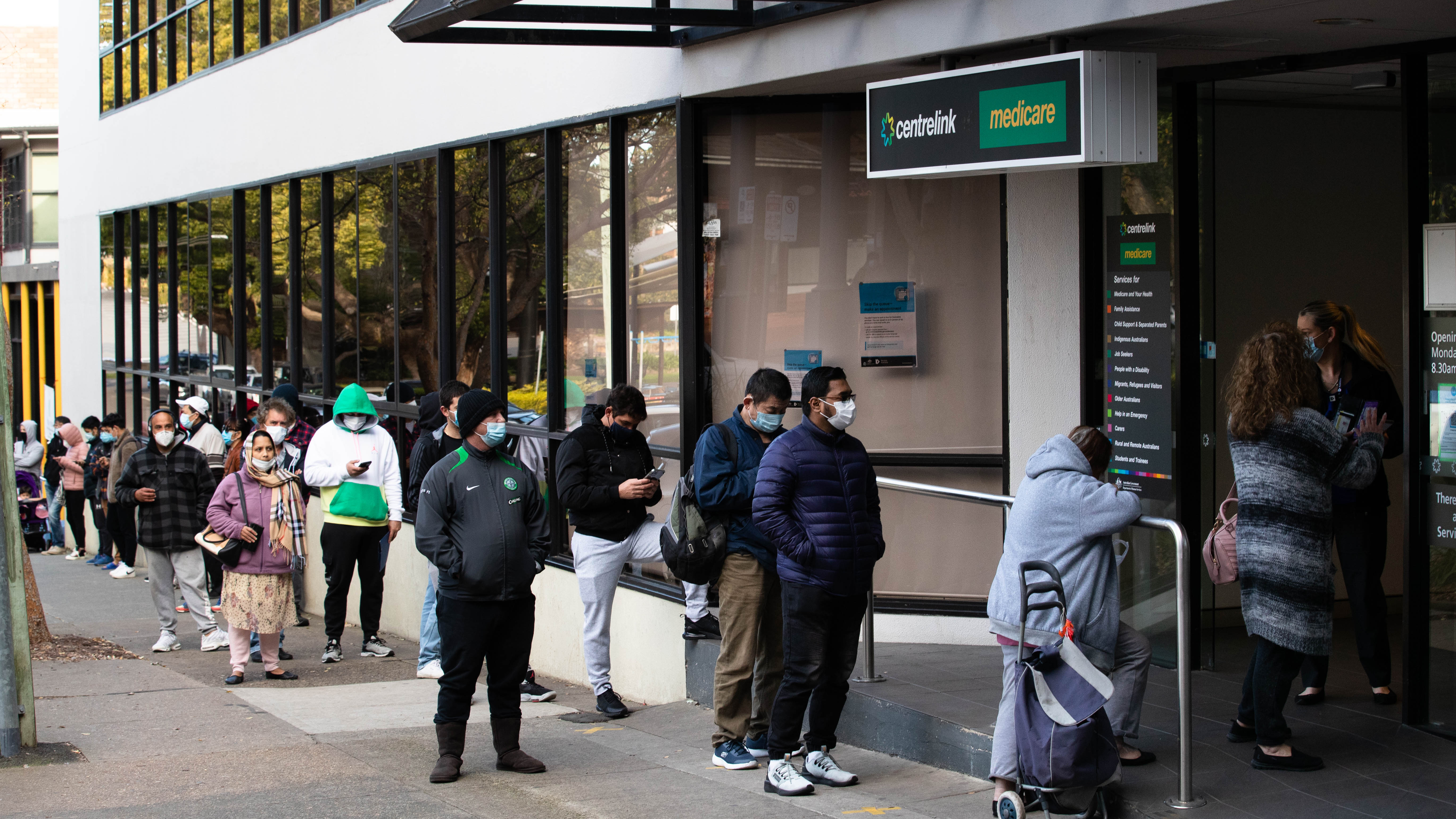 The queue for Centrelink in Campsie stretches down the street, during Sydney's lockdown.