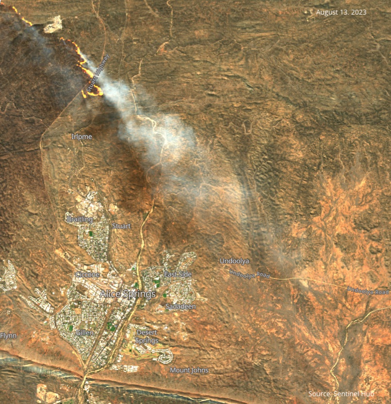 A fire burning across the Stuart Highway, north of Alice Springs.