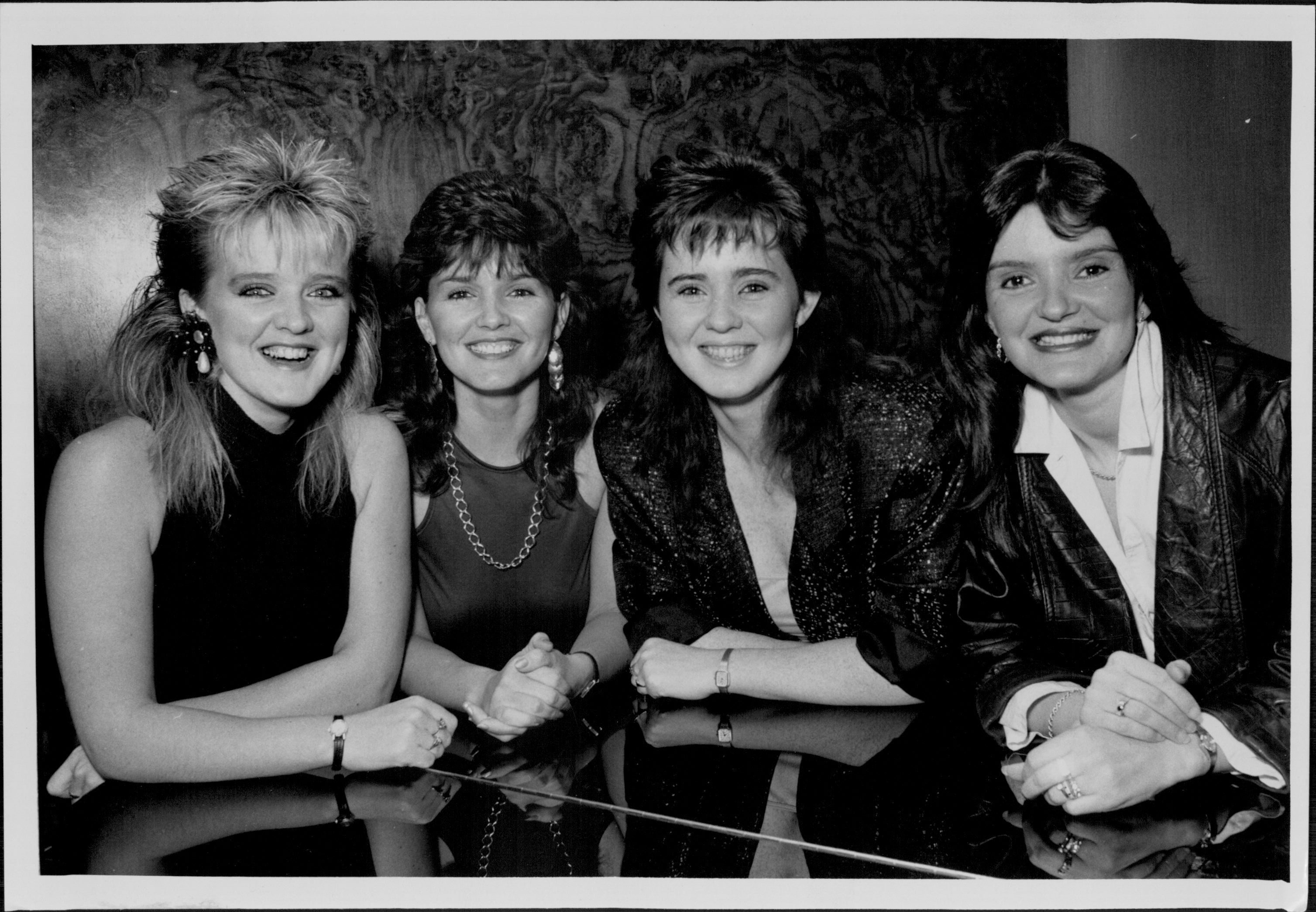 The Nolan sisters, British singing group here to tour Aust. pictured at the Southern cross hotel. L to R. Bernie, Maureen, Coleen, Anne. May 19, 1986. (Photo by Barry Chapman/Fairfax Media)