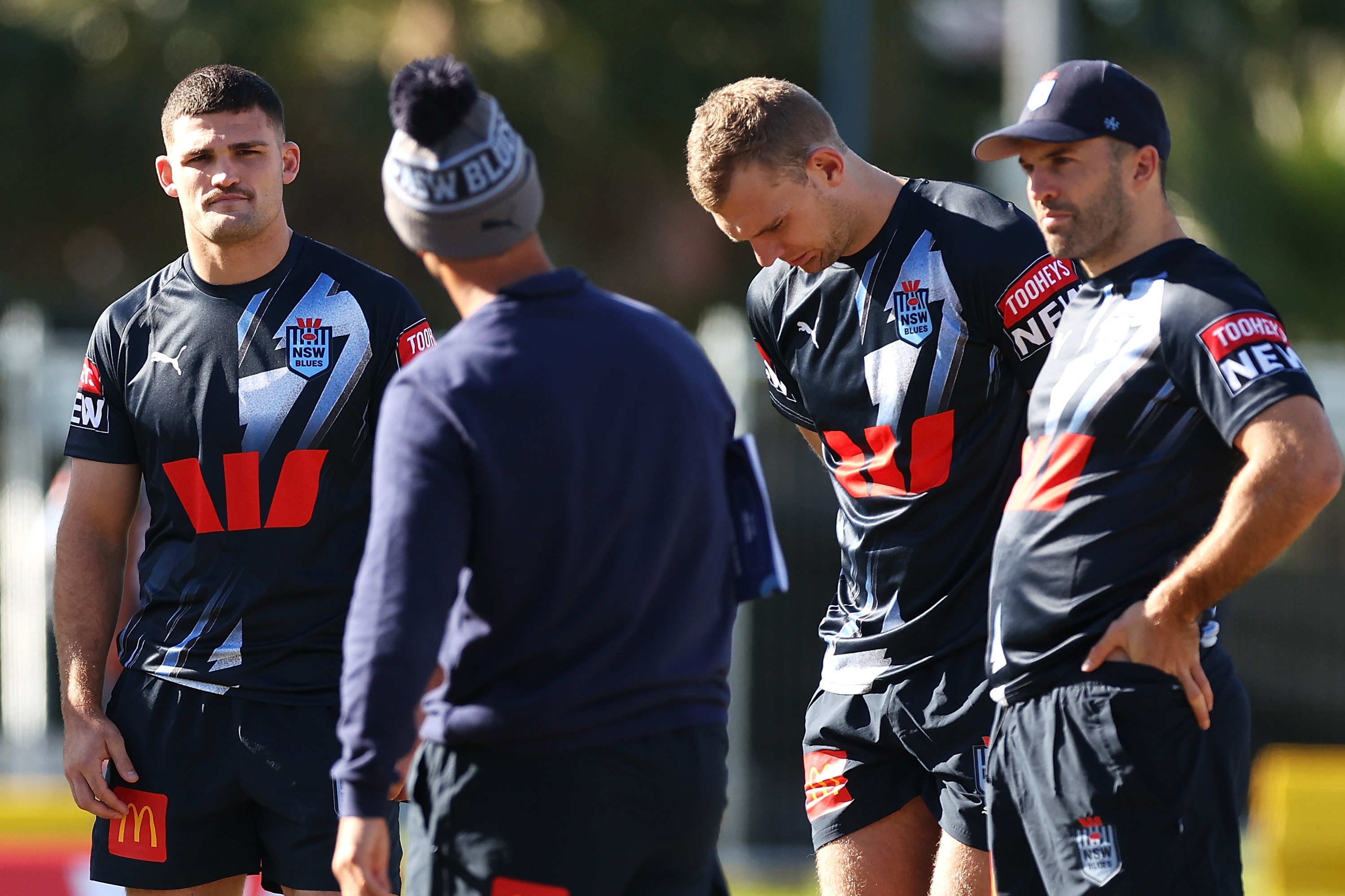 Nathan Cleary and his team mates listen on as Andrew Johns speaks during a New South Wales Blues State of Origin training session at Coogee Oval on May 23, 2023 in Sydney, Australia. (Photo by Mark Kolbe/Getty Images)