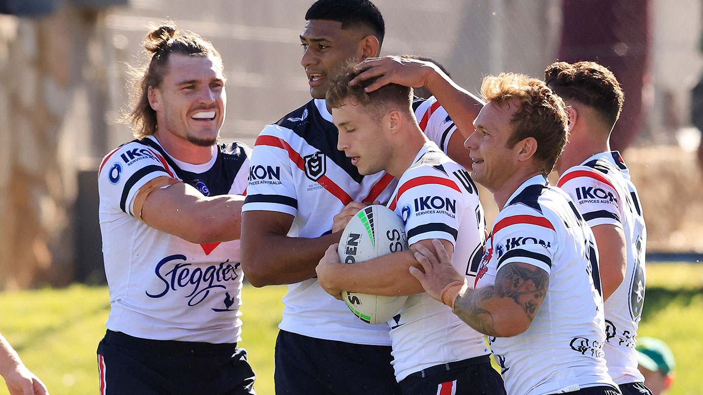  Sam Walker of the Roosters celebrates a try with team mates during the NRL trial Match between the Sydney Roosters and the Canberra Raiders at Seiffert Oval on February 27, 2021