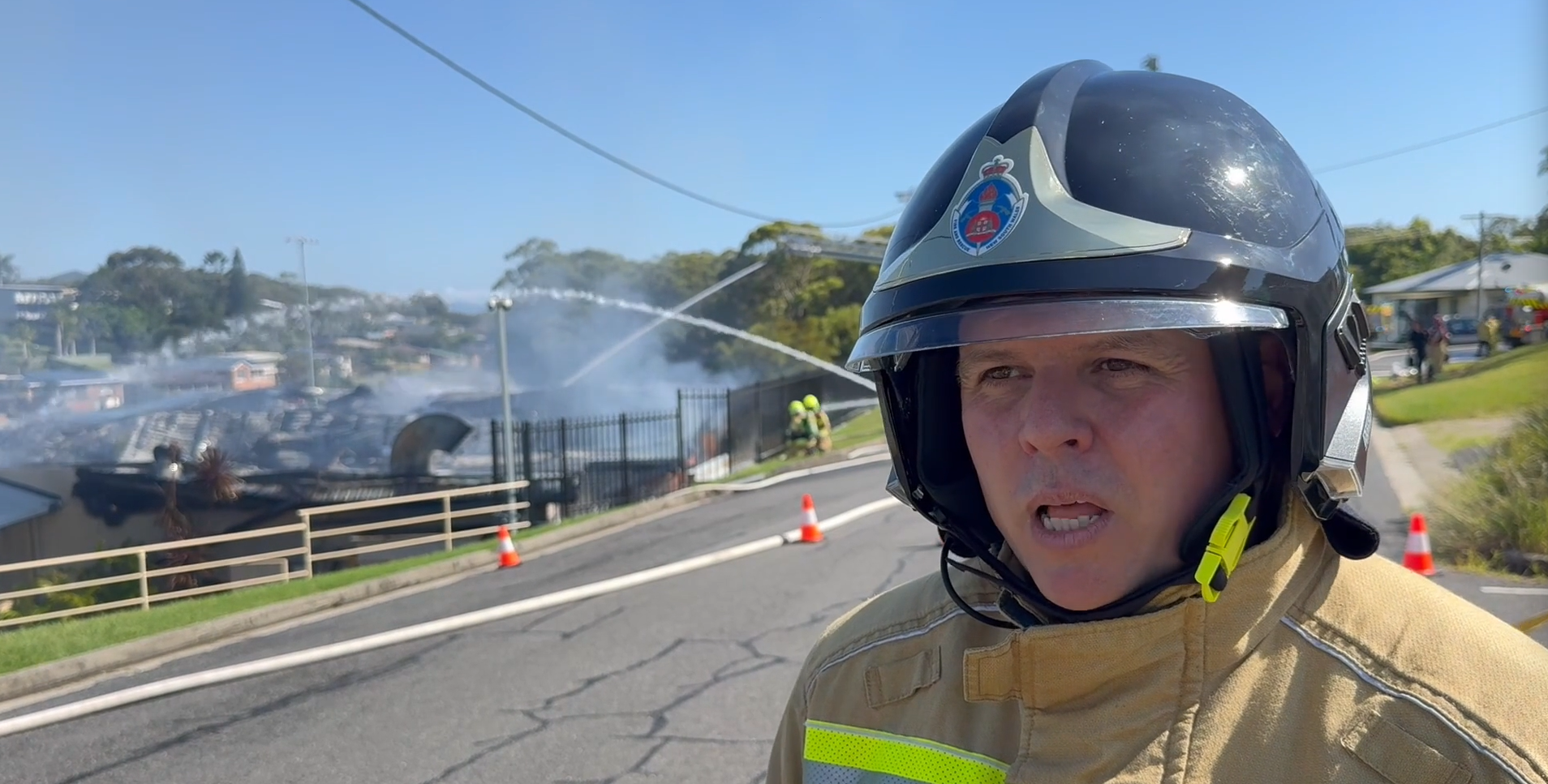 A lack of water supply and several nearby gas cylinders ﻿are threatening to worsen a destructive fire that engulfed a beloved sports club in NSW's Mid North Coast.