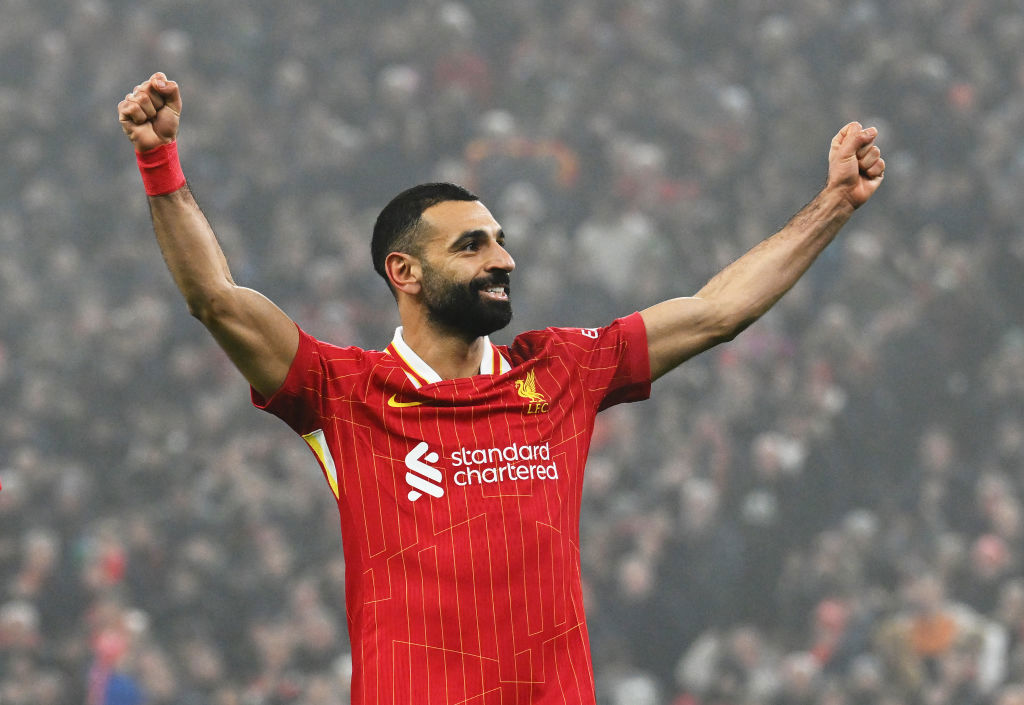 Mohamed Salah of Liverpool celebrates scoring his team's third goal against Leicester City.