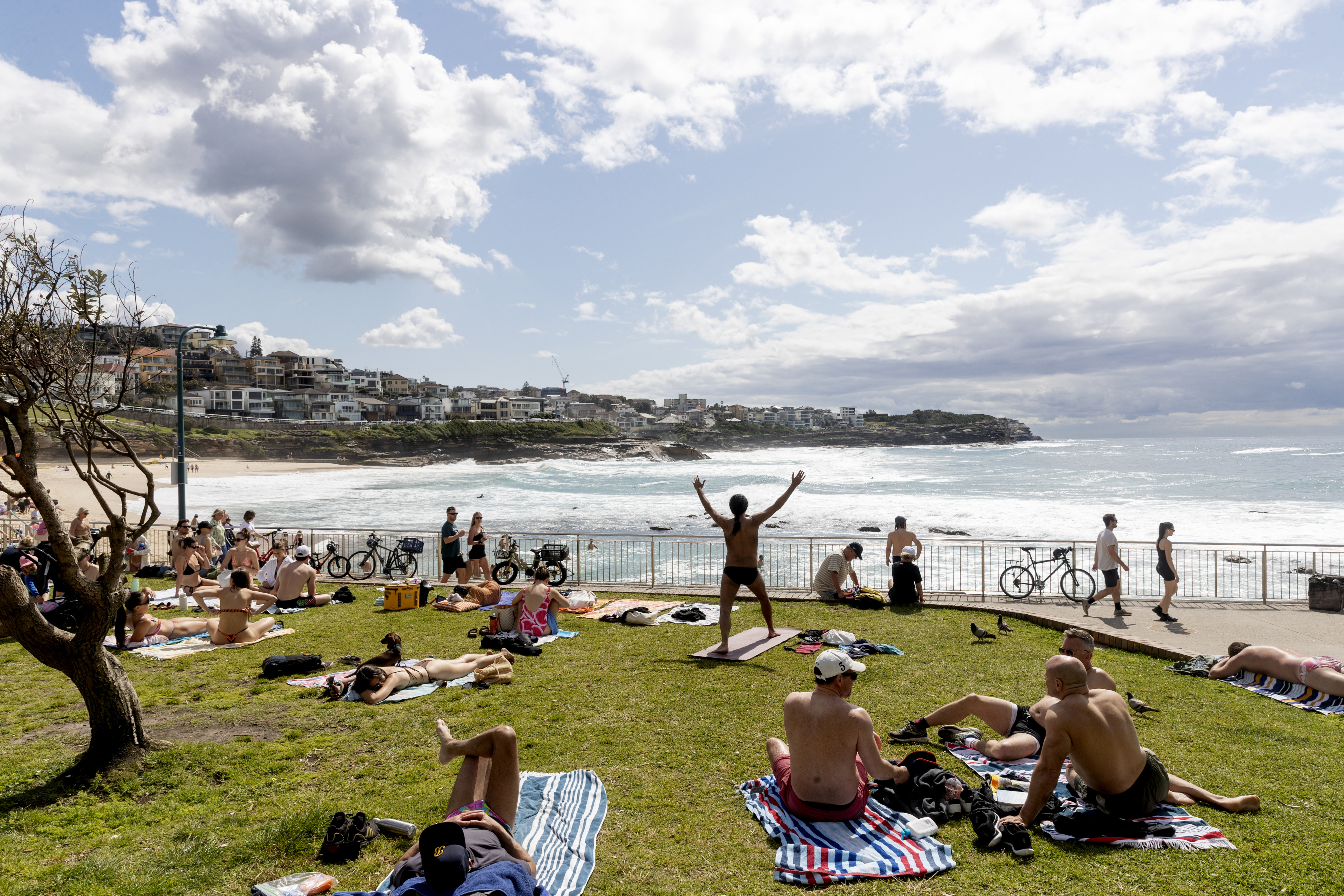 People enjoy the sunshine on the Labour Day long weekend public holiday at Bronte Beach, Sydney, Monday October 3, 2022. 