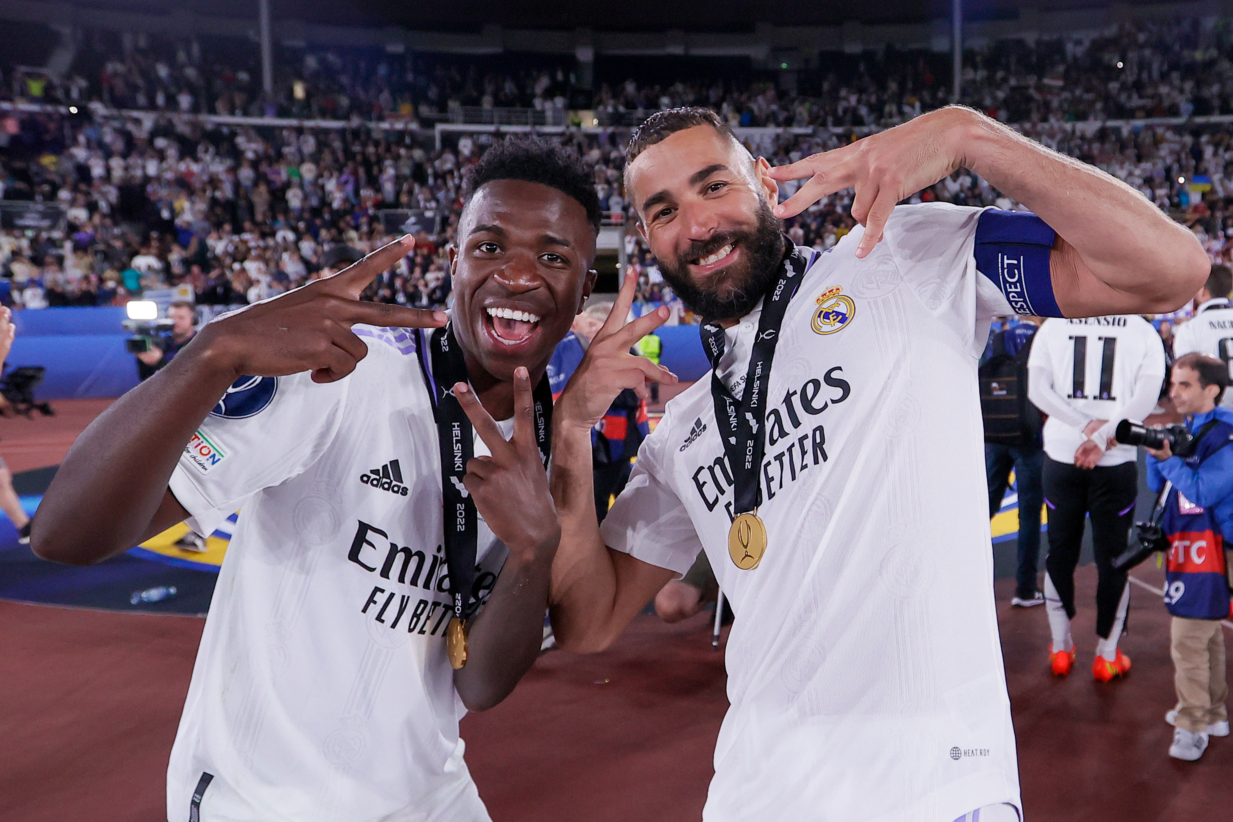 Vinicius Junior and Karim Benzema of Real Madrid celebrating.