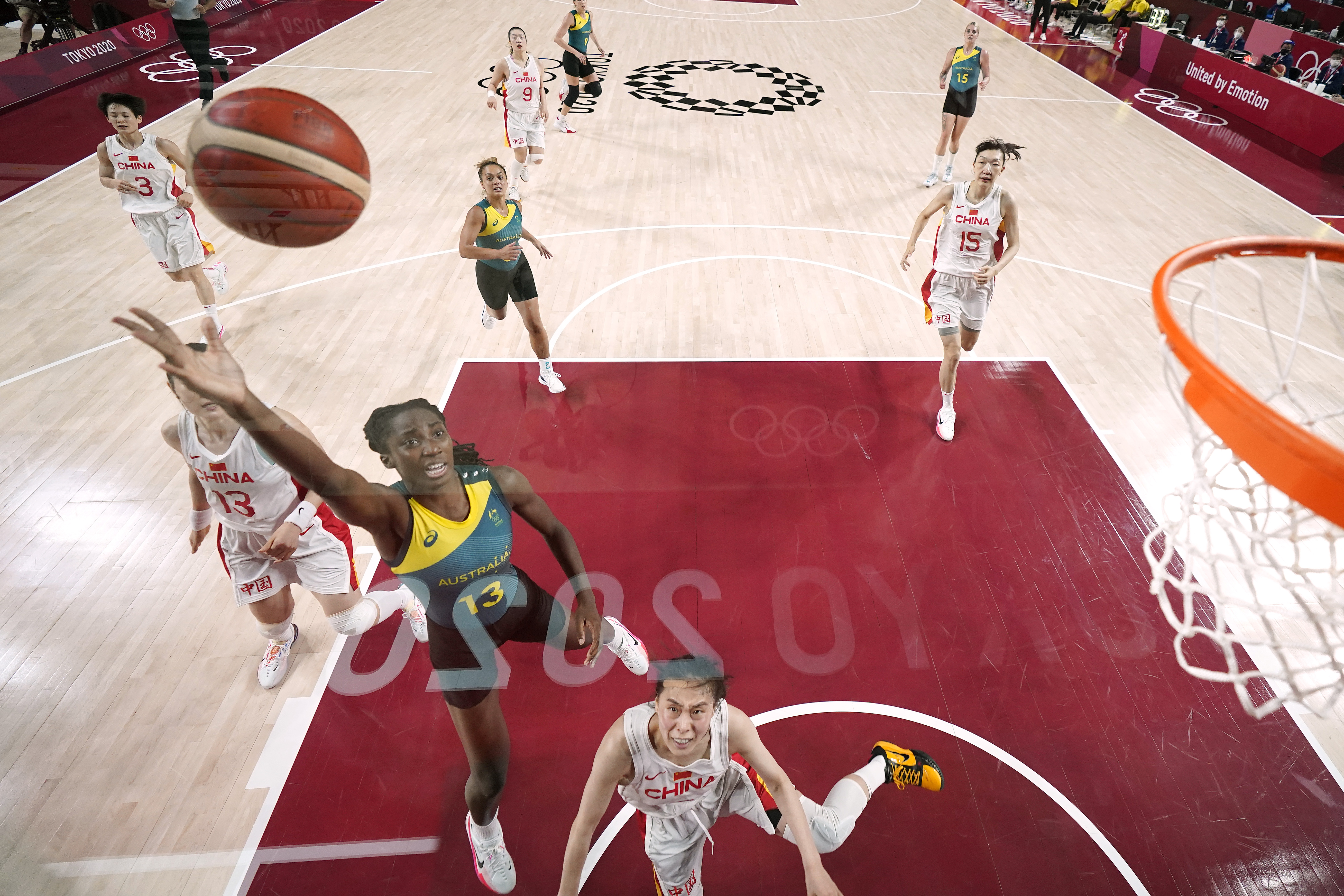 Australia's Ezi Magbegor drives to the basket against China.