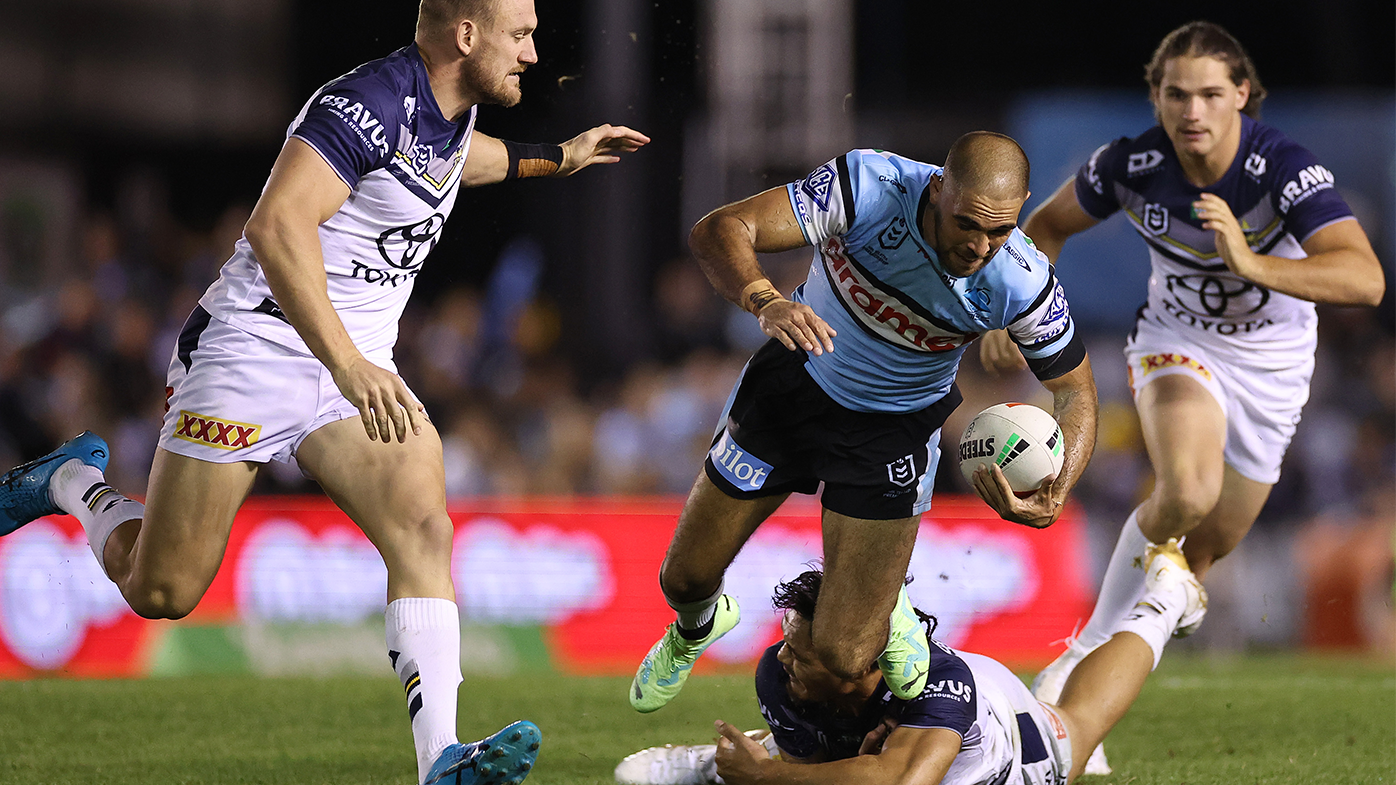 Scott Sorensen of the Panthers is tackled during the NRL Round 12 match  between the Brisbane Broncos and the Penrith Panthers at Suncorp Stadium in  Brisbane, Thursday, May 18, 2023. (AAP Image/Jono