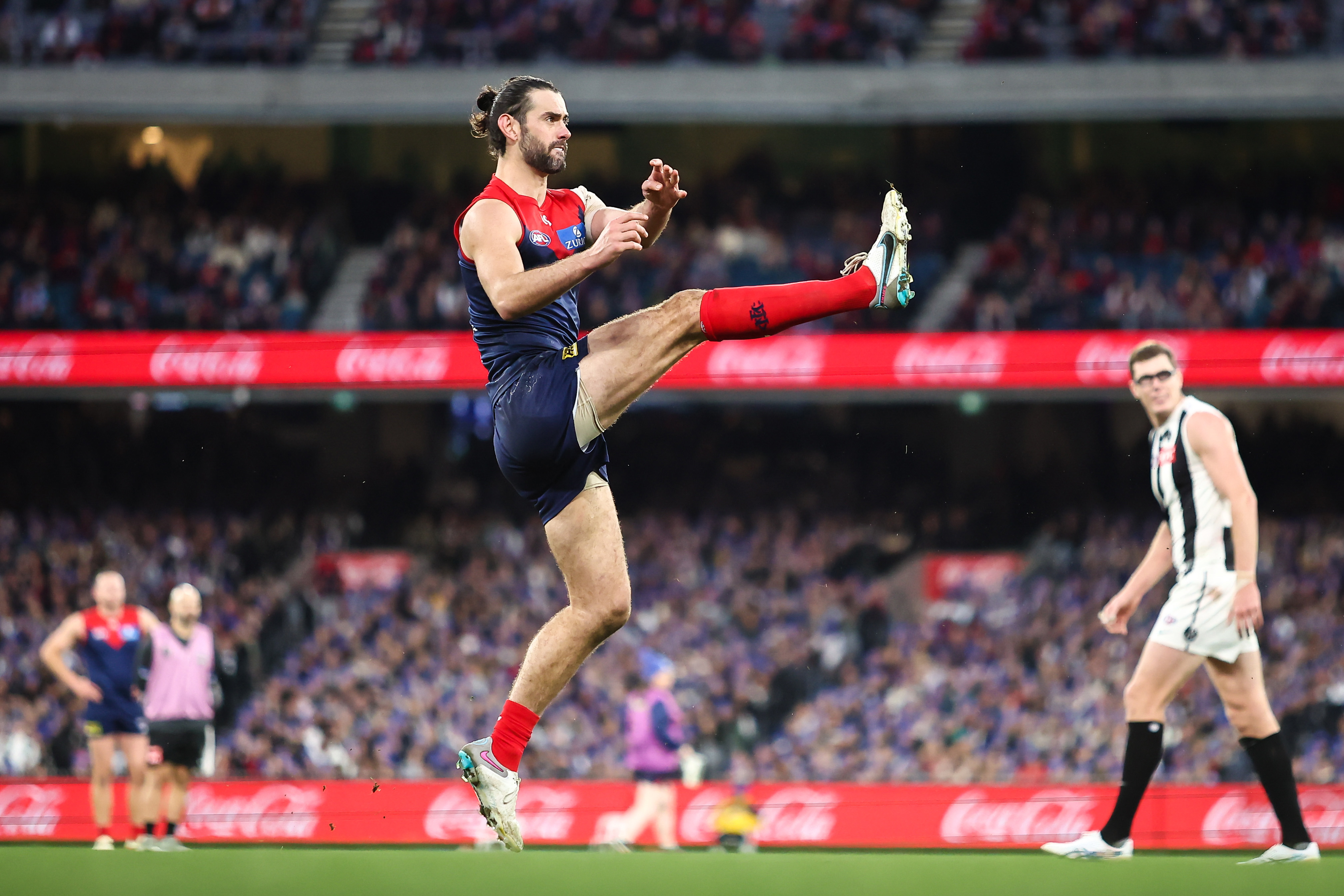 MELBOURNE, AUSTRALIA - JUNE 12: Brodie Grundy of the Demons kicks a goal during the 2023 AFL Round 13 match between the Melbourne Demons and the Collingwood Magpies at the Melbourne Cricket Ground on June 12, 2023 in Melbourne, Australia. (Photo by Dylan Burns/AFL Photos via Getty Images)