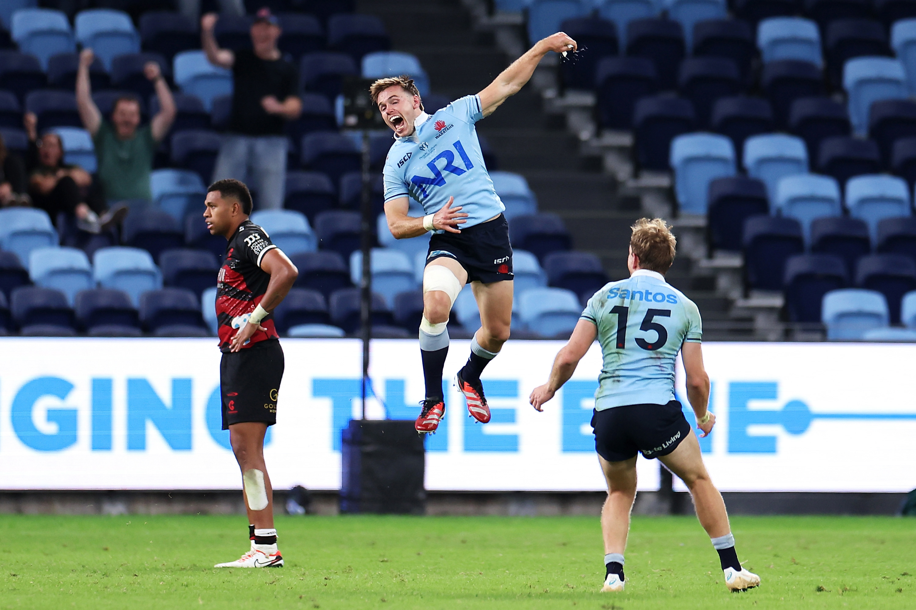 Will Harrison of the Waratahs celebrates kicking the winning field goal in golden point during the round eight Super Rugby Pacific match between NSW Waratahs and Crusaders.