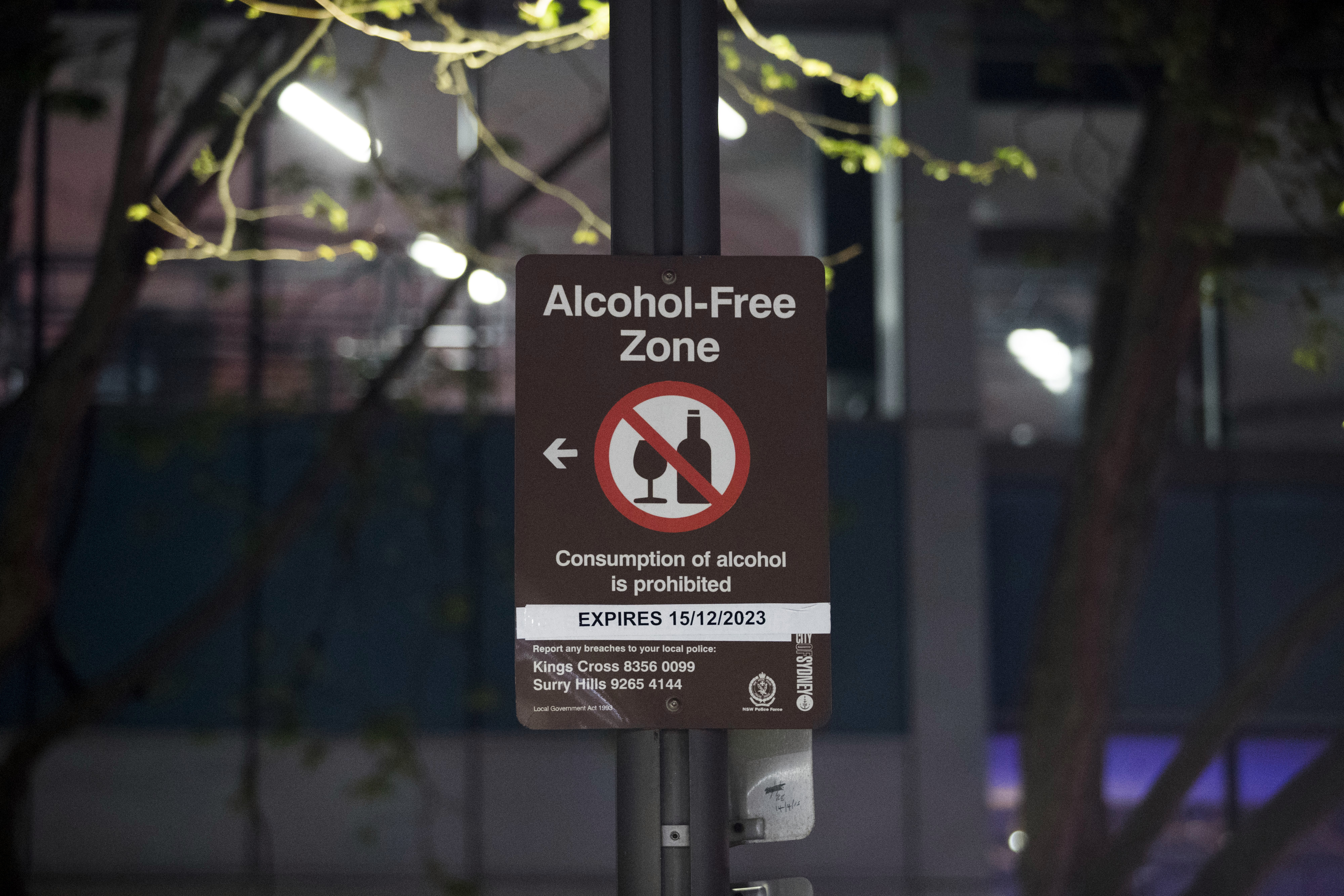 An alcohol-free zone sign in the Kings Cross area in Sydney, Australia, on Wednesday, Sept. 14, 2022. Australia's biggest city is dusting off long-held plans to bring the harbor metropolis to life after the sun goes down from spending on live music, and art and culture, to making late-night shopping a reality. Photographer: Brent Lewin/Bloomberg