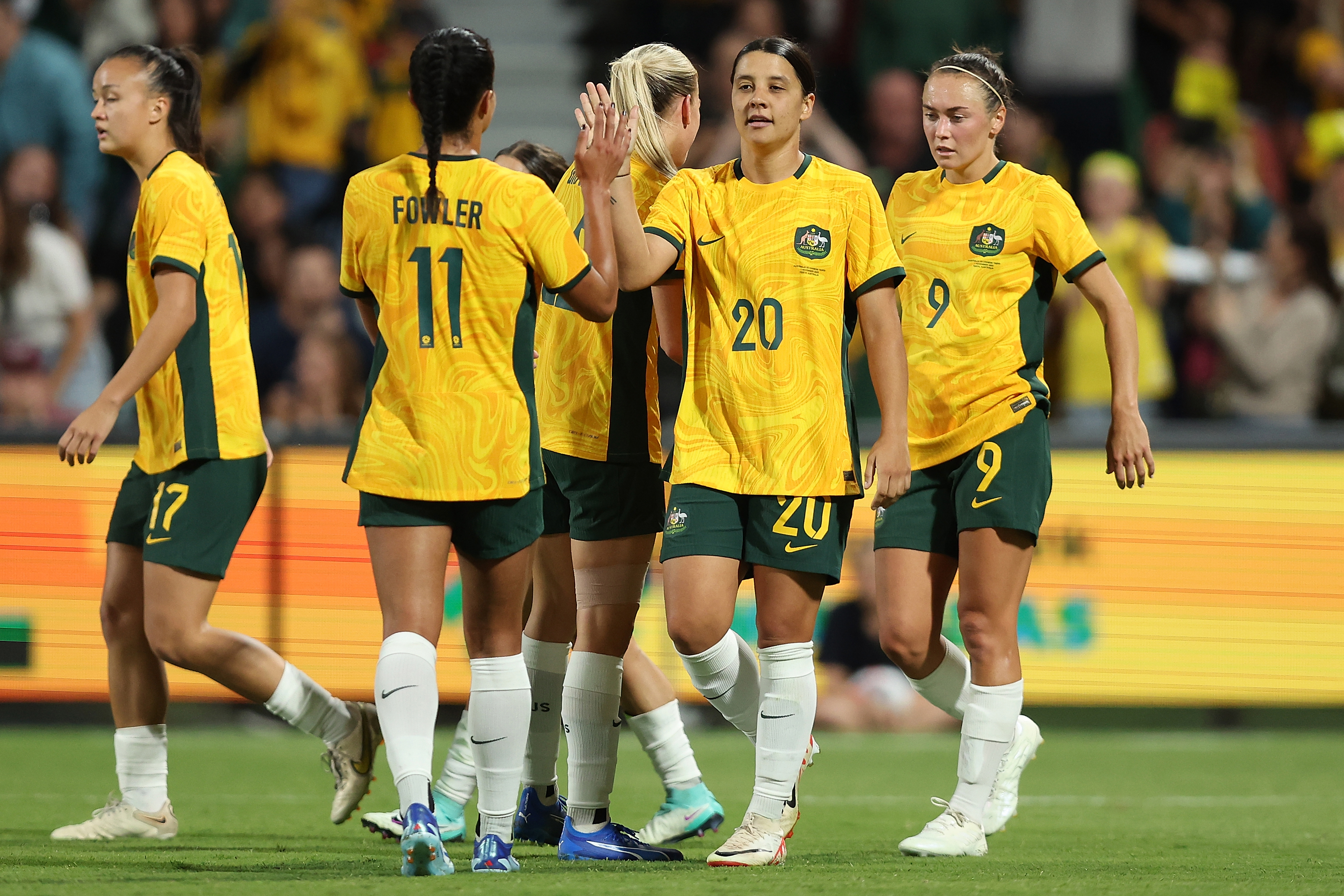 Samantha Kerr of Australia celebrates a goal during the AFC Women's Asian Olympic qualifier match between Australia and Chinese Taipei.