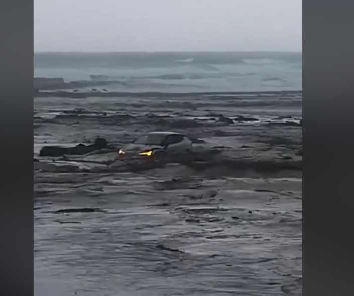 Cars were swept out to sea at Wye River as a result of flash flooding.