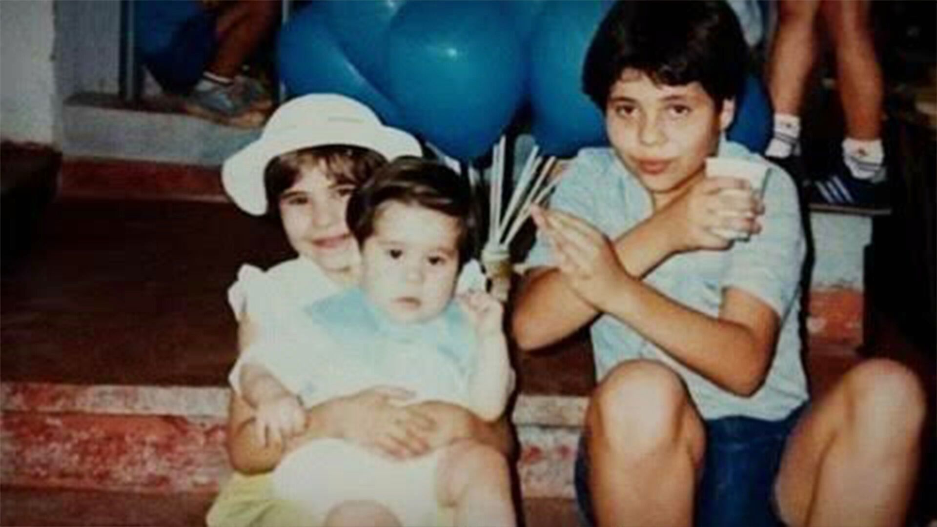 Catiuscia Machado and her brothers.